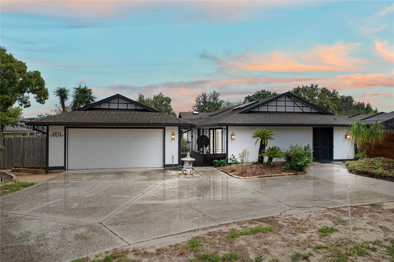 Located in one of the most sought-after neighborhoods in the area!  This stunning 4-bedroom, 2 bathroom post-modern architectural gem is awaiting a new homeowner to call this masterpiece home. Elegance and sophistication radiate from every corner of this property and showcases the seamless transition from the spacious interior to the tranquility of a private outdoor oasis.  Upon entering, your eyes will be immediately drawn to the expansive sliding door wall allowing for an abundance of soft natural light. You will be mesmerized by the attention to details evidenced by high-end improvements and maintenance.  The new gourmet kitchen will be the envy of your family and friends with sleek dual-toned cabinetry and stylish high-end efficient appliances.  The bathrooms have all received remarkable upgraded finishes as well.  Fresh paint throughout the interior and the exterior make this home move-in ready.  You will further note the upgraded light fixtures, doors, and flooring throughout the entire home. The bedrooms are generously sized and have ample closet and storage space! Step out to the rear of the property and enjoy your own tranquil oasis which includes an in-ground pool and covered patio overlooking a large private backyard.  Additionally, the pool has been resurfaced,  a brand-new roof has been put on the house, and new a/c units installed for new homeowner peace of mind. Location is ideal with close proximity to A-rated schools, restaurants, and shops! Luxury and tranquility abounds on almost a full half acre of land.  This home is not just a place to live; it’s a statement. Book your private viewing today and move in before the holiday season is upon us!
