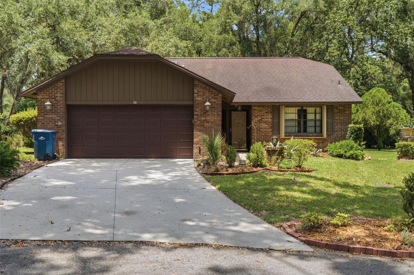 Welcome to this 2-bedroom, 2-bath single-family home tucked away on a cul-de-sac in the desirable Trails West community of DeLand. Freshly painted inside and out, this home offers a bright, inviting atmosphere with a functional layout perfect for everyday living. Surrounded by mature trees and a peaceful, wooded setting, you’ll enjoy privacy and the beauty of nature right from your own backyard. Trails West is known for its established charm, tree-lined streets, and convenient location just minutes from historic downtown DeLand, shopping, dining, medical facilities, and major roadways. Come say yes to the address and schedule your showing today! **MLS Info is intended to be correct but is not guaranteed and all information must be verified by buyers.**