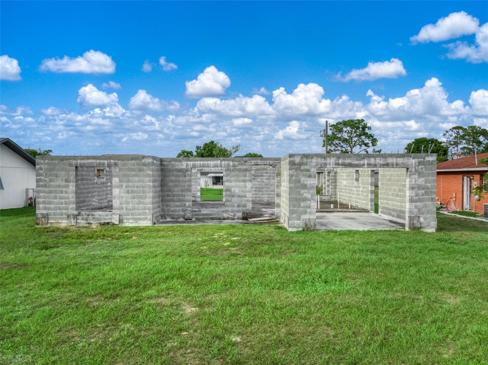 Welcome to Sebring, known as “The City on the Circle”. This growing community is a perfect mix of natural beauty and small town charm as seen on HGTV’s Home Town Takeover. The property offers a fantastic opportunity to bring your dream home to life. The building process is already underway, giving you a strong head start toward completion while still allowing room to make it your own. The proposed building plans feature a thoughtfully designed residence totaling 2041 SF, including 1346 SF of living space, a 322 SF 2 car garage, 309 SF covered lanai and 64 SF front porch. Located on a 1/4 acre cleared lot in the already established and well maintained community of Sebring Hills. Just minutes from all major shopping dining and entertainment. A stone’s throw to the iconic Circle Park. Easy access to HWY 27. Centrally located and situated approximately 90 miles from both the Atlantic Ocean and the Gulf Coast, as well as the Orlando International and Tampa International Airports.