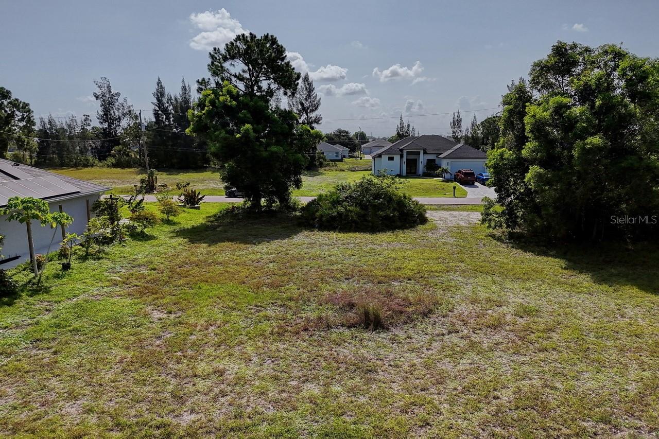 Build your dream home on this prime homesite in desirable NE Cape Coral! This generous 80' x 125' lot offers plenty of room for a spacious custom home, pool, and outdoor living area. Situated on a quiet street in an established neighborhood with NO HOA, you'll enjoy easy access to shopping, dining, schools, parks, and major roadways while maintaining a peaceful residential setting. Located in Flood Zone X, this property is outside the Special Flood Hazard Area according to FEMA maps. Whether you're ready to build your forever home or invest for the future, this property offers an outstanding opportunity in one of Southwest Florida's fastest-growing communities. Enjoy convenient access to the Caloosahatchee River, where public parks, boat ramps, fishing, kayaking, and waterfront recreation are just a short drive away—giving you all the benefits of the Florida lifestyle without paying waterfront prices. As Cape Coral continues to grow, vacant lots in desirable neighborhoods are becoming increasingly scarce. Don't miss your chance to secure your piece of paradise and start building the home you've always envisioned.
Disclaimer: A gopher tortoise burrow was previously identified on the property (March 2023). Gopher tortoises are a protected species under Florida law, and the current status of the burrow or any tortoise occupancy has not been verified by the seller. Buyers are encouraged to conduct their own due diligence regarding the property's current conditions, permitting, construction requirements, and any relocation or mitigation that may be necessary prior to development.