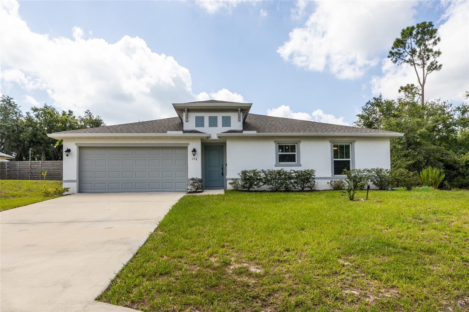 Why wait to build when you can move right into this 2023-built home? Located in the desirable Palm Harbor, this 4-bedroom, 2-bathroom residence offers 1,652 square feet of thoughtfully designed living space on a spacious 10,000-square-foot lot.

The open-concept floor plan creates a seamless flow between the kitchen, dining, and living areas, making everyday living and entertaining both comfortable and convenient. The split-bedroom layout provides privacy for the owner's suite while offering flexibility for family members, guests, or a home office.

Built in 2023, this home offers the advantages of newer construction without the delays, rising costs, and uncertainty of building. Enjoy modern finishes, a functional layout, and low-maintenance living from day one.

With no HOA fees or restrictions, you'll have the freedom to enjoy your property your way. Conveniently located near schools, shopping, dining, medical facilities, parks, golf courses, and just a short drive to Flagler County's beautiful beaches, this move-in-ready home is an excellent opportunity for anyone seeking the Florida lifestyle.

Don't miss your chance to own a newer home in one of Palm Coast's most convenient location. Schedule your private showing today.
