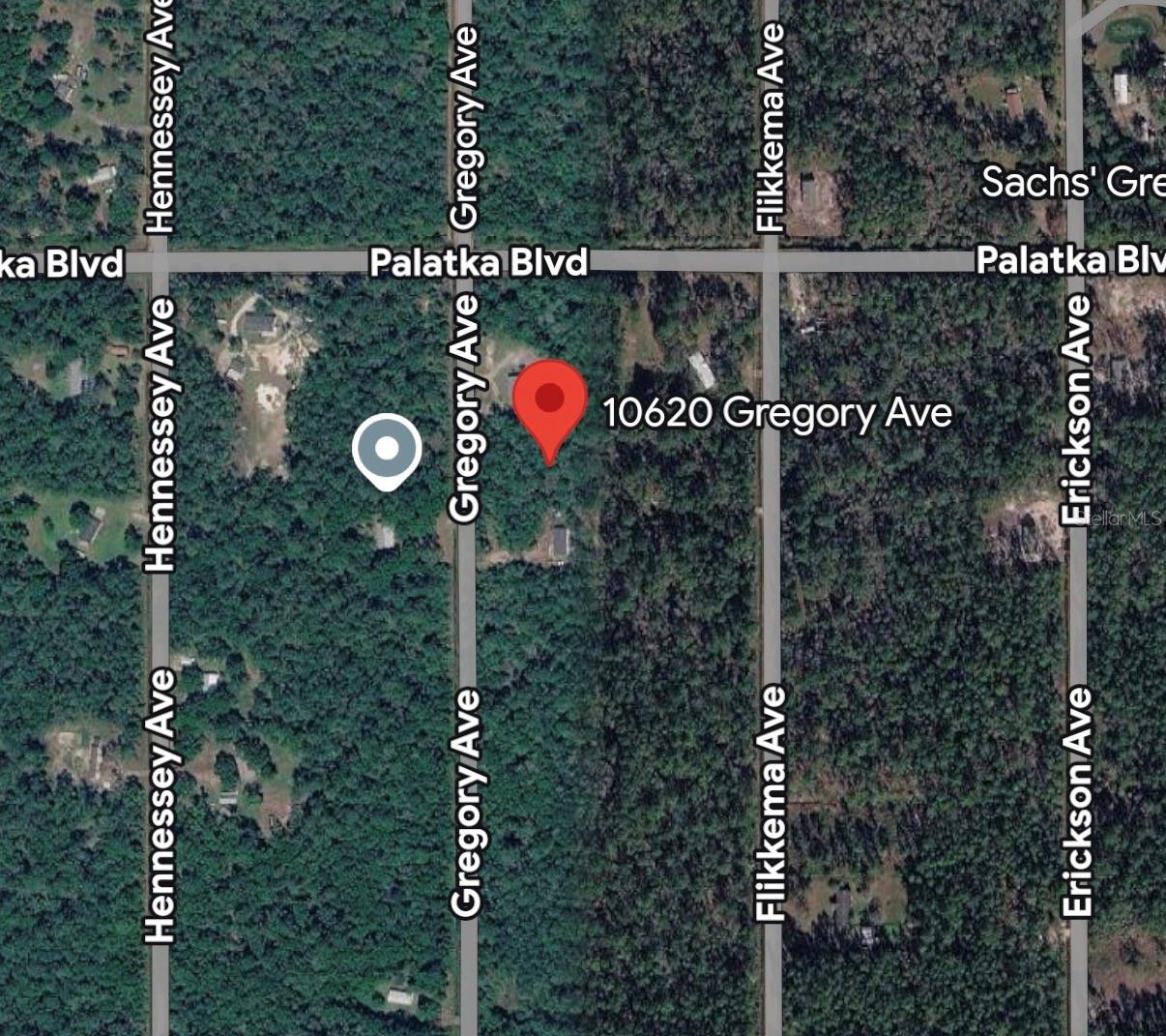 Discover the potential of this oversized west-facing homesite at 10629 Gregory Ave in the desirable Flagler Estates community of St. Johns County. Offering over an acre of land, this spacious parcel provides plenty of room to design the home you’ve always envisioned while still having space for a detached garage, workshop, garden, or outdoor entertaining area. Enjoy a peaceful rural setting with convenient access to major roadways, including Flagler Estates Boulevard, Cedar Ford Boulevard, County Road 13, and State Road 207, making travel to Hastings, St. Augustine, Palm Coast, and Palatka simple and convenient. Nearby parks, recreational opportunities, shopping, dining, and historic attractions for the perfect balance of country living and modern convenience. Whether you’re looking to build now or invest for the future, this generously sized lot presents an excellent opportunity in one of St. Johns County’s growing communities. Don’t miss your chance to own a beautiful piece of Florida land with endless possibilities.
