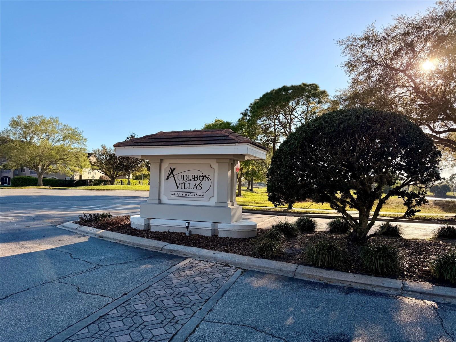This 2-bedroom, 2-bathroom condo in the heart of the gated Audubon Villas community of highly desirable Hunter's Creek, offers you an unparalleled resort-style living experience. Exquisitely designed with Mediterranean-style architecture, enjoy luxury amenities like lush landscaping, tennis and basketball courts, lakeside swimming pool and heated spa, a fully equipped athletic club, an extensive business center and a beautiful clubhouse available for private parties or meetings. This gorgeous home promises an open floor plan with plenty of counter & cabinet space in the kitchen, and a breakfast bar that overlooks the living room and dining area. The master and second bedroom both include walk-in closets and the bathrooms have a tub and shower combination. Additional luxuries include an in-unit laundry closet with washer & dryer, plus an extra storage closet on the balcony. Enjoy nearby local transportation, schools, and The Loop Mall with 70 Stores, 15 Restaurants, and Regal Cinema 16. Easy access to major roadways, like Osceola Parkway, I-4 and the 417 make it convenient to get to the areas finest attractions including Walt Disney World, Downtown Disney, Sea World, Universal Studios, City Walk, Downtown Orlando and the Orlando International Airport. With a brand new HVAC system (2023!), water heater (2024), this luxurious condo is the perfect place to call home, as a primary residence, second home, or an incredible investment opportunity!