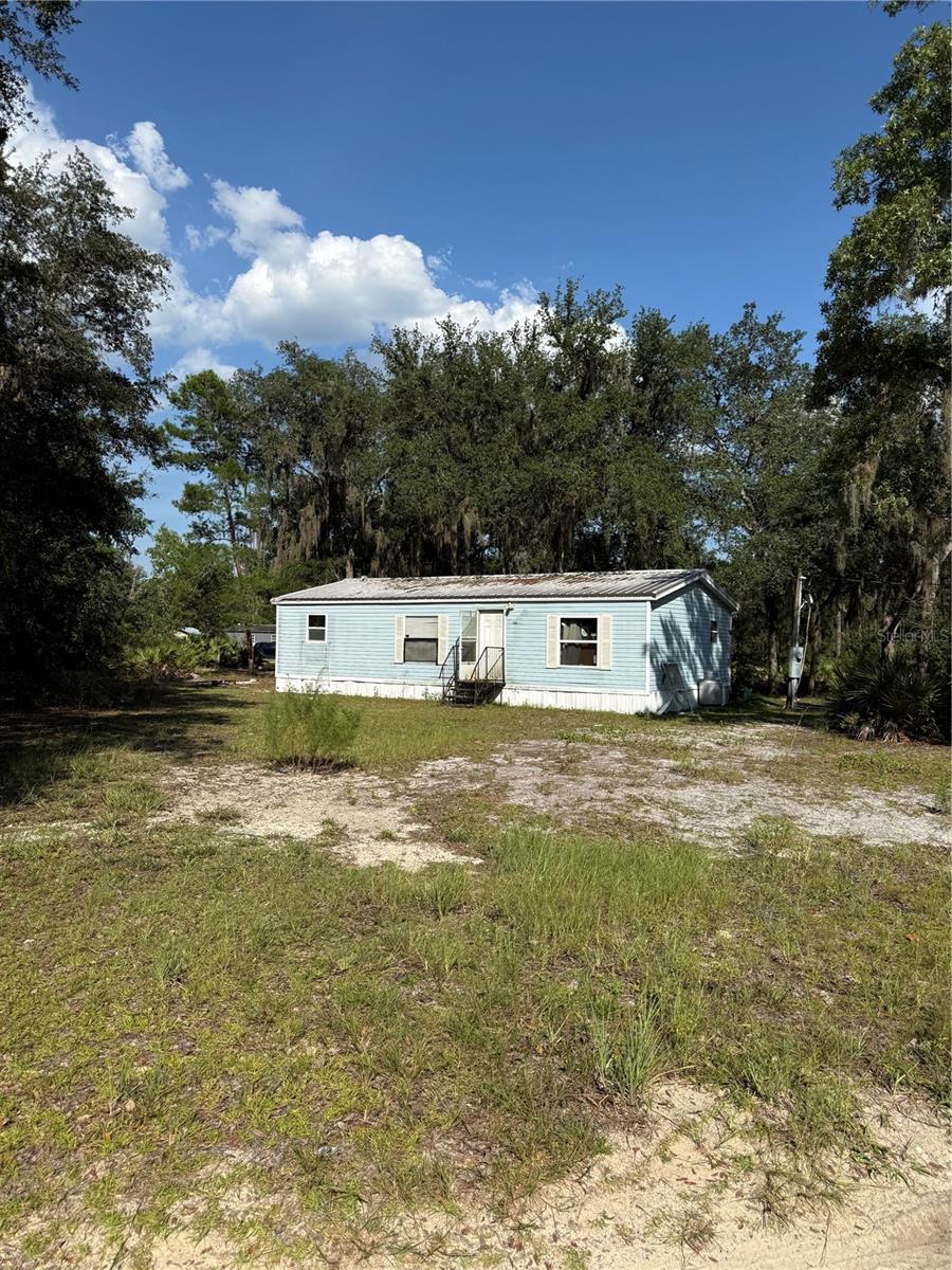 Fixer upper or investment opitunity! Escape to the peaceful countryside with this charming home situated on 1.32 acres bordering a state forest, offering privacy, natural beauty, and abundant wildlife right outside your door. The property features a new storage shed, a 2023 HVAC system, and plenty of space to enjoy outdoor living. Inside, the home offers great potential with some interior updates needed, making it an excellent opportunity to add your personal touch. Whether you're looking for a primary residence, weekend retreat, or investment property, this home offers the perfect blend of country living and convenience. Seller financing is available, providing a unique opportunity for qualified buyers. Don't miss your chance to own this private retreat with direct access to nature!