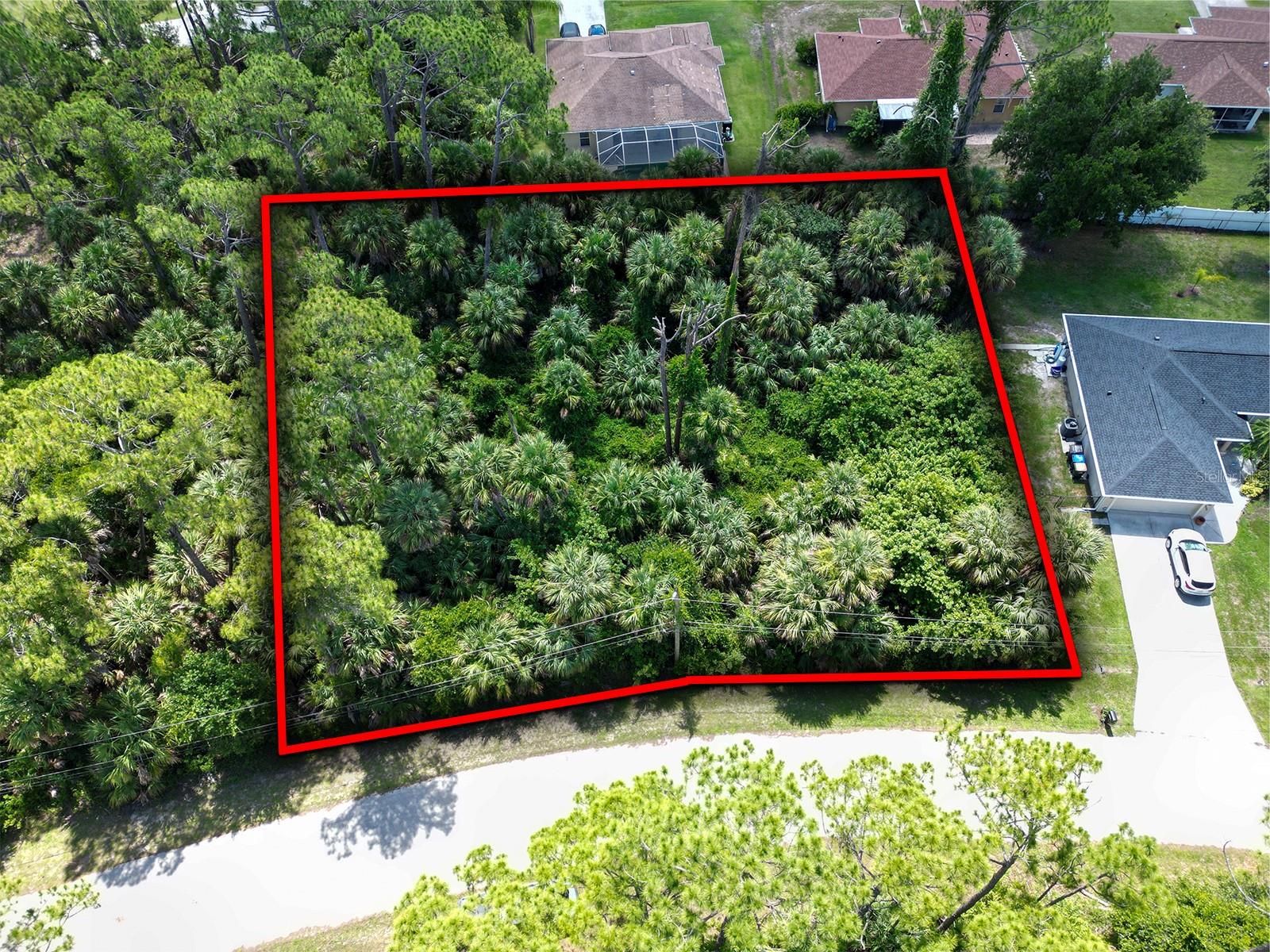 Oversized double lot opportunity in the heart of North Port! Lots 24 & 25 Maywood Lane offer a combined 20,591 sq. ft., or approximately 0.47 acres, giving you nearly half an acre to design and build your Florida dream home with extra space for a larger floor plan, pool, detached garage, garden, or outdoor living area. This property sits in a highly convenient North Port location with no HOA, giving you more flexibility and control over your build. This property is located in Flood Zone X, meaning no mandatory flood insurance is typically required by lenders, and the lot appears to be relatively easy to clear with limited hardwood vegetation compared to many heavily wooded parcels in the area. Build an affordable new construction home in one of Sarasota County’s fastest-growing cities while still enjoying privacy, space, and no deed restrictions. The location is a major highlight, only approximately 2.8 miles from the new Sarasota Memorial Hospital–North Port campus currently under construction, a major state-of-the-art medical project expected to bring expanded healthcare access, jobs, and continued growth to the area. North Port continues to attract buyers looking for newer homes, larger lots, no HOA options, and convenient access to I-75, shopping, dining, schools, parks, Warm Mineral Springs, Wellen Park, Venice, Port Charlotte, and Sarasota’s Gulf Coast beaches. Whether you are a builder, investor, or future homeowner, this oversized double lot offers the space, location, and flexibility that are getting harder to find in North Port. Buyer to verify zoning, utilities, lot dimensions, flood zone, building requirements, and all due diligence with the City of North Port and Sarasota County.