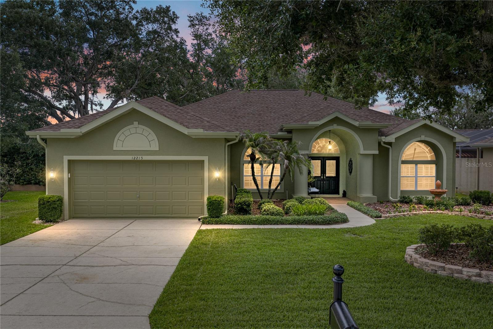 Set behind the gates of Lake Jovita, an amenity-filled golfing community known for its rolling scenery and resort-style lifestyle, this 3 bedroom, 2 bath home rests on a beautiful pond-view setting with valuable updates already in place. A 2024 roof, climate-controlled enclosed back porch, newer interior and exterior paint, and new bedroom carpet add meaningful appeal, while the peaceful backdrop gives the home a setting that feels unmistakably Lake Jovita. Mature trees, lush landscaping, and a covered entryway create a warm and welcoming arrival. Inside, the thoughtful floor plan is filled with features that make the home feel inviting and easy to enjoy. Wood flooring, crown molding, French doors, and open sightlines bring character to the main living spaces, while the layout allows you to host with ease. The living room flows naturally into the formal dining room, into the well-equipped kitchen, or out to the newly enclosed porch that now lives like extra square footage. The kitchen offers breakfast bar seating, a 4 piece stainless steel appliance package, pantry storage, easy-maintenance countertops, and a cozy eat-in dinette for casual meals. Privately split from the secondary bedrooms, the primary suite features 2 walk-in closets and an ensuite bathroom with dual sinks, a walk-in shower, and a water closet. Bedrooms 2 and 3 are generously sized and sit near the home’s second full bathroom, complete with a large garden tub. A dedicated laundry room, a 2 car garage, new storm shutters, and new gutters add everyday function, while the enclosed climate-controlled porch may be the space you enjoy most. With a wall of windows overlooking the backyard and pond, it creates a peaceful place to read, work, relax, or simply take in the view year-round. Lake Jovita offers a guarded gated entrance, playground, park, and walking trails, with optional membership packages available for 2 world-class 18-hole golf courses, a Junior Olympic size pool, tennis courts, clubhouse, restaurant, fitness center, pro shop, and more. Call today to schedule your private tour and experience this Lake Jovita home for yourself!