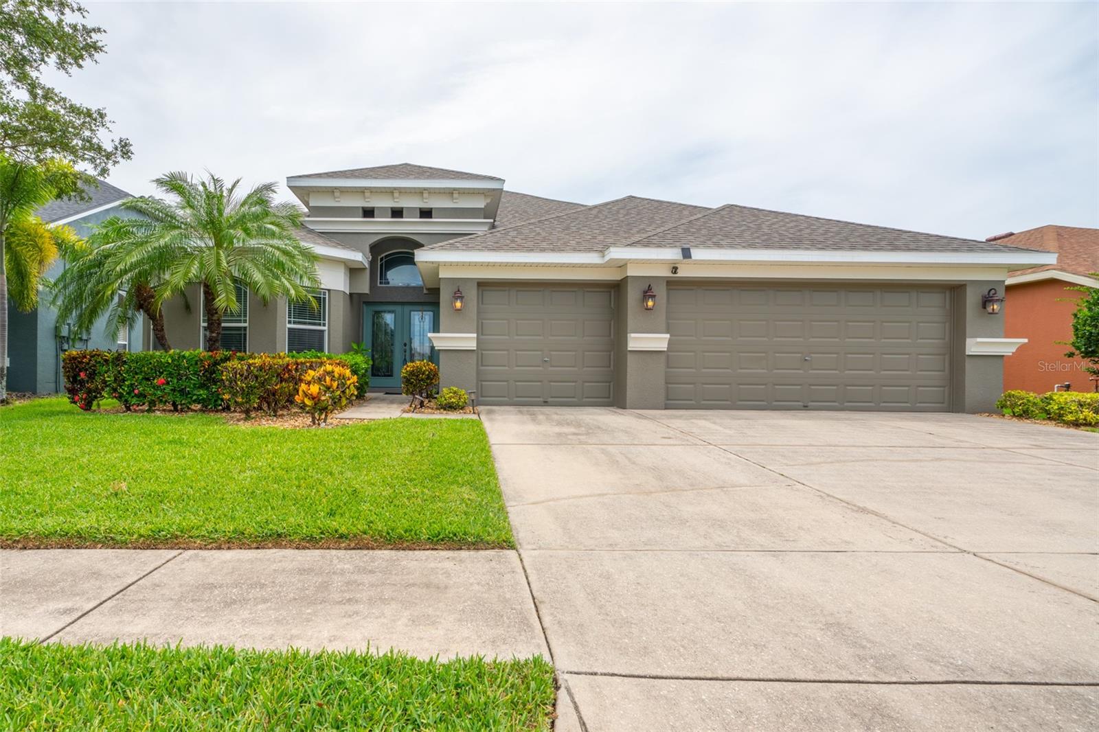 WELCOME TO THIS GATED COMMUNITY OF MIRA LAGO. NO FLOOD INSURANCE REQUIRED. This 4 bedroom, 3 full bathrooms (one is pool bath), 3 CAR GARAGE PLUS LARGE BONUS ROOM WITH ENDLESS POSSIBILITIES. TWO OFFICES BOTH WITH DOUBLE FRENCH DOORS, perfect for working from home, hobbies or just flexible living. You will love the open floor plan complete with mostly luxury vinyl flooring (carpet only in 3 bedrooms & bonus room), kitchen with granite counter tops, abundance of Bordeaux cabinets & recessed lighting. Large primary suite with big walk-in closet, dual sinks, garden tub with separate shower. Spacious family room with sliding glass doors leading out to screened in pool and fully fenced. Massive bonus room completes the 2nd floor. NEW ROOF (2024), A/C (2025), HEATED SALT WATER POOL (2023) EXTERIOR PAINTED AUG 2025. LOW CDD FEE! Easy access to Tampa, St Pete, Sarasota and beautiful beaches. Minutes away from Little Harbor Resort/Marina where you can enjoy amazing sunsets. Boat launch, shopping & waterfront restaurants nearby. The community offers swimming pool, playground, club house, walking/bike trails. Don't let this one get away, call today for showing!