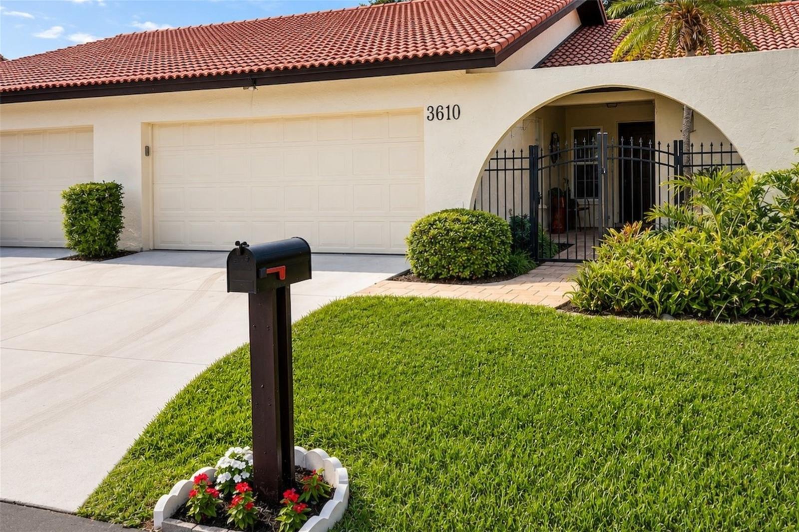 Nestled on a quiet dead-end street in the highly sought-after 55+ community of Village Plaza, this beautifully renovated Sarasota villa offers the perfect blend of comfort, style, and convenience. Featuring 2 bedrooms, 2 bathrooms, and a spacious 2-car garage, the home showcases an open-concept layout with soaring vaulted ceilings and abundant natural light throughout the main living area. The updated kitchen features modern finishes and flows seamlessly into the dining and living spaces, creating an ideal setting for both everyday living and entertaining. Neutral tones and laminate flooring throughout provide a clean, cohesive aesthetic, while recent upgrades include a new water heater (2026), comfort-height toilets (2025), all water lines replaced (2023), appliances (2023), and durable, waterproof epoxy-coated garage flooring for added style and practicality. Enjoy year-round Florida living from the enclosed lanai, the perfect space for morning coffee or evening relaxation. Village Plaza is known for its vibrant social atmosphere and resort-style amenities, including a clubhouse, heated community pool, pickleball courts, fitness center with sauna and showers, billiards, and shuffleboard. Ideally located just minutes from downtown Sarasota, the community also offers convenient walkable access to shopping, dining, and everyday essentials. Outdoor enthusiasts will appreciate being less than a mile from the renowned Legacy Trail, one of Sarasota’s premier destinations for walking, biking, and recreation. This exceptional villa combines thoughtful updates, an active lifestyle, and an unbeatable location in one of Sarasota’s most desirable communities.