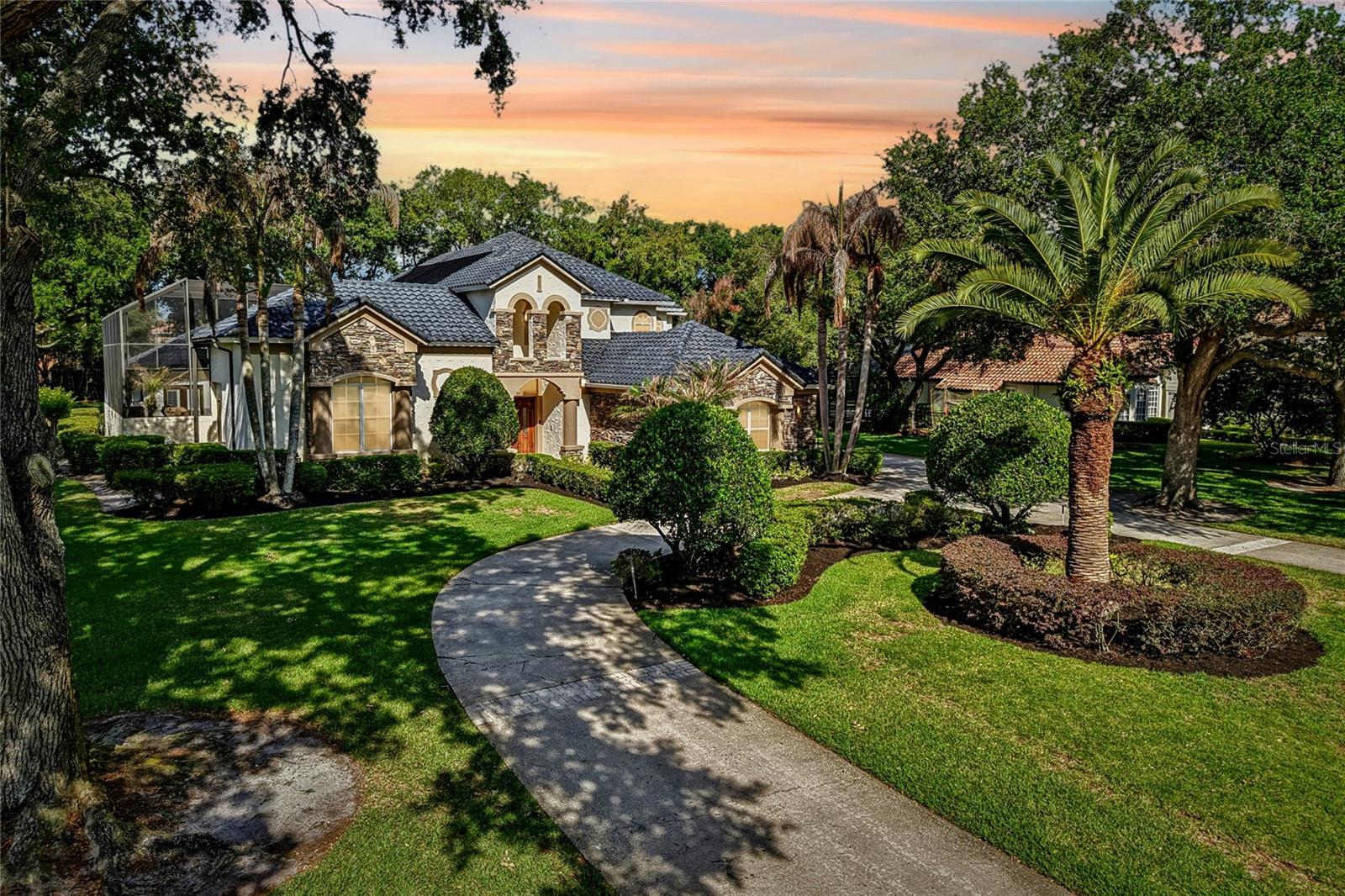 One or more photo(s) has been virtually staged. Private Windermere Estate in Guard-Gated Waterford Pointe with Detached Guest Casita and Lake Access.  

A rare opportunity in one of Windermere’s most established guard-gated communities, this private estate offers the space, flexibility, and lifestyle today’s luxury buyers are actively seeking. Set on over an acre within Waterford Pointe, the property combines architectural presence, exceptional privacy, and resort-inspired living in a peaceful enclave known for estate-sized homes, mature landscaping, and private access to Lake Roberts.

Designed around a dramatic courtyard pool, the home creates a true indoor-outdoor lifestyle experience, ideal for both grand entertaining and everyday living. The detached guest casita is a standout feature, offering exceptional flexibility for guests, private office use, wellness retreat, creative studio, or evolving lifestyle needs.

Inside, soaring ceilings, polished marble tile flooring, detailed crown molding, and dramatic two-story living spaces create a sense of scale and elegance throughout. The thoughtfully updated chef’s kitchen is designed for gathering, featuring quartz countertops, an oversized island, premium KitchenAid and Bosch appliances, double ovens, wine refrigeration, and seamless connection to the expansive family room with custom built-ins and fireplace.

The private first-floor primary suite serves as a true retreat, offering direct courtyard and pool access, a spacious custom walk-in closet, and a beautifully appointed bath with dual vanities, jetted soaking tub, and walk-in shower. A second first-floor suite provides ideal accommodations for guests or family.

Upstairs, expansive, flexible living spaces include a large game room overlooking the courtyard, a dedicated office with custom built-ins, a private fitness room with balcony access, and additional secondary bedrooms thoughtfully arranged for privacy and functionality.

Outdoor living is equally compelling, with a screened resort-style saltwater pool and heated spa with waterfall, covered summer kitchen, multiple entertaining spaces, and the privacy that only a homesite of this scale can provide.

Waterford Pointe residents enjoy an exceptional lifestyle with private access to Lake Roberts, a waterfront clubhouse, tennis courts, playground, and beautifully tree-lined streets—all within one of Windermere’s most desirable gated communities.

Additional highlights include a 4-car garage, a new whole-house generator, three HVAC systems, a newly painted exterior courtyard, and highly regarded local schools.

For buyers seeking privacy, architectural character, flexible living, and established Windermere luxury—without the premium of direct lakefront pricing—this is a compelling opportunity.

**Private tours available by appointment**
