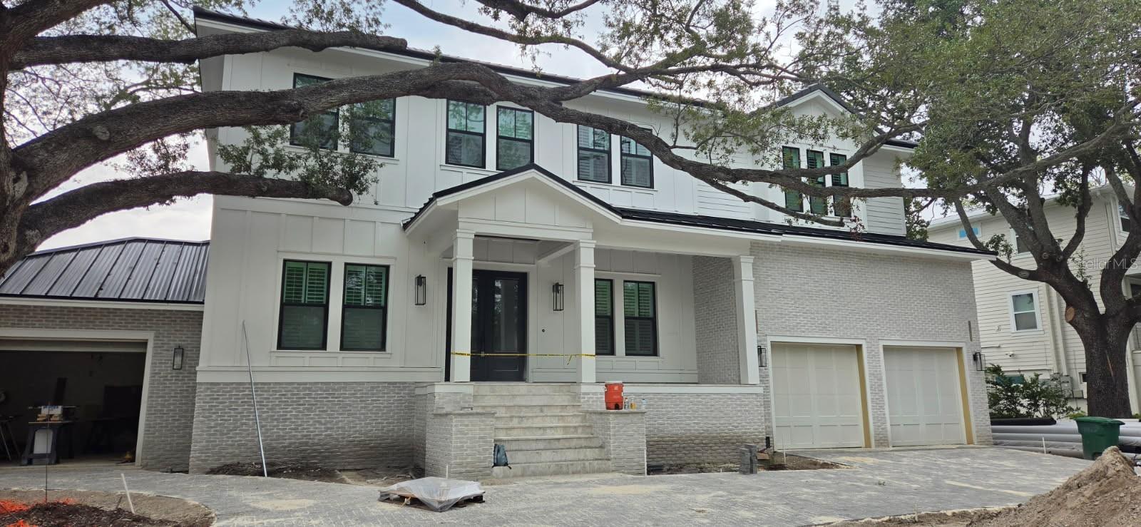 Under Construction. New waterfront Davis Islands Home with 5 bedrooms, 4.5 baths, plus a den and a loft. Top quality workmanship and attention to detail, including but not limited to new dock with covered boat lift, newly dredged area around dock, and lowering platform, wood floors throughout, high ceilings, open floor plan, hardwood floors, upgraded tiles, heavy trim package, gourmet kitchen with large island, Inset cabinets, Marble/Quartz countertops, custom Wolf/Subzero appliances, large walk-in closets and much more. Bring your boat and start living the Islands lifestyle! Located on beautiful Davis Islands, not too far from the walking and bike path, and just a short distance away from Davis Islands Village with many restaurants, shops, and bars. Bring your golf cart and enjoy the Island lifestyle with walking/biking paths, baseball fields, public tennis courts, public historic pool, two dog parks (one wet and one dry), a beach, public marina, and an airport. Located only minutes from Downtown Tampa, Water Street, Sparkman Wharf, and the Tampa Riverwalk, this neighborhood is the most desired in South Tampa!