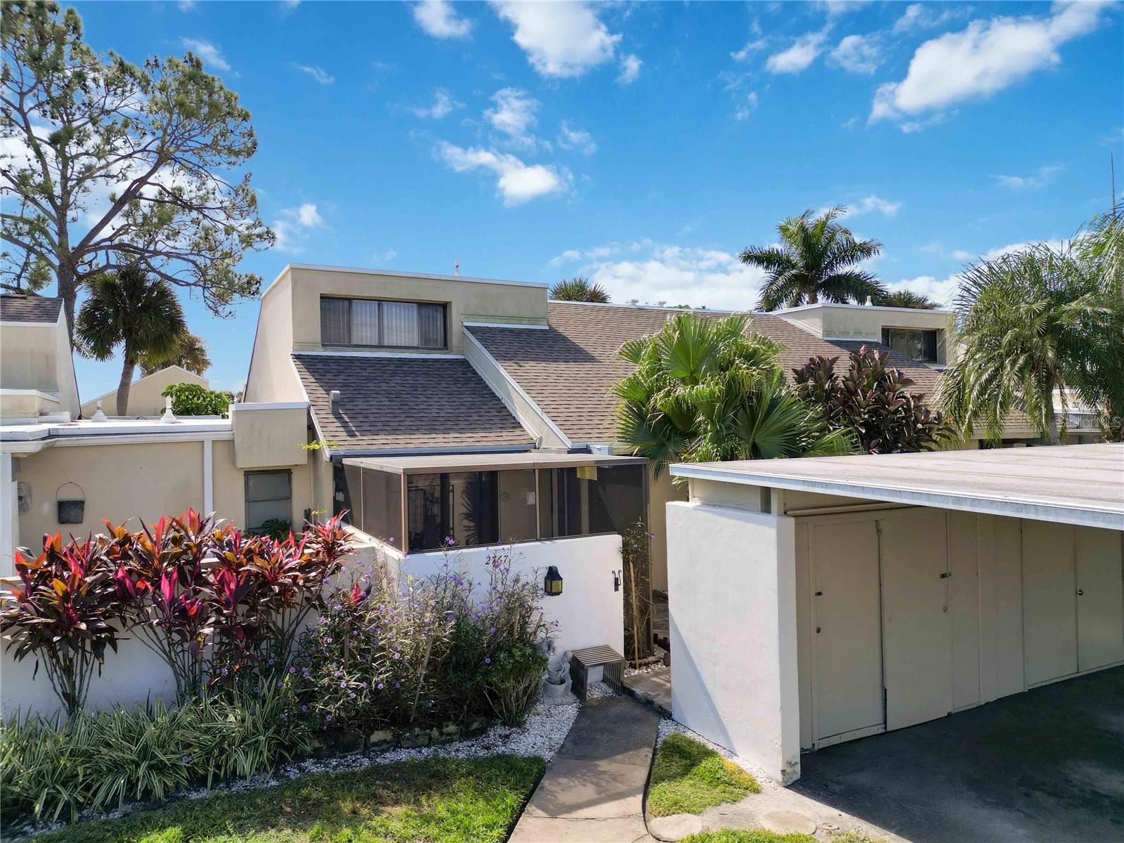 Welcome to The Meadows in Sarasota! This 3-bedroom and 2-bath bright and spacious two-story condominium features an open layout with cathedral ceilings and abundant natural light. The primary bedroom is conveniently located on the ground floor, while the two upstairs bedrooms provide great extra space for guests, a home office, fitness, or hobbies. Enjoy two spacious patios — a screened front patio for morning coffee and a relaxing garden-style patio in the back to unwind at sunset. This unit offers plenty of storage, including a walk-in attic, under-stair storage, and a covered carport with its own storage area.

Living in The Meadows feels like being at a resort all year long — with miles of walking and bike trails, lakes, lush mature landscaping, tennis courts, a pickleball complex featuring 8 new courts, a clubhouse, a fitness center, a playground, and a golf course throughout the community. The heated community pool is a few steps from the back porch. Take a short drive to UTC Mall, Benderson Park, Whole Foods, I-75, restaurants, shopping, Downtown Sarasota, St. Armand’s Circle, Siesta Key, or the stunning Gulf beaches. Country Club membership is optional. This is Sarasota living at its best — comfortable, stylish, and ready for you to enjoy.