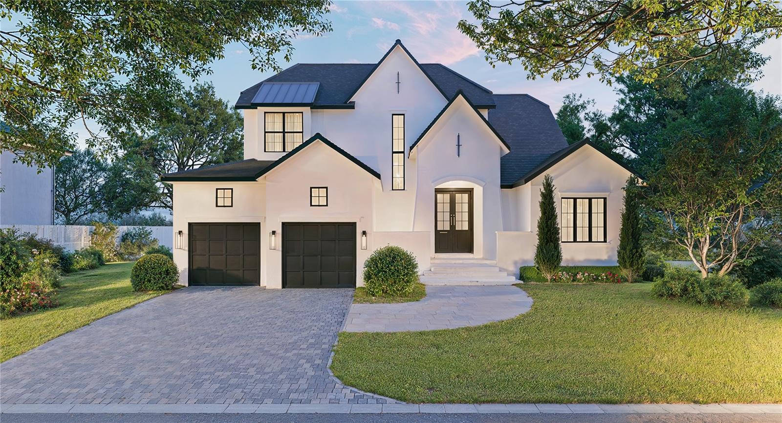 Under Construction. This exceptional, boater’s residence is ideally positioned on Hudson Bayou, designed to impress at every turn. Showcasing the very best of Sarasota’s waterfront lifestyle, the property features outstanding boating amenities, including 80 feet of new concrete seawall and cap, a private dock with lift and davit, and convenient bay and Gulf access beneath two fixed bridges. Spanning 3,906 square feet, the “Callie” model blends modern elegance with effortless livability. From the moment you arrive at 1821 Lincoln Drive, handcrafted iron doors open to a dramatic foyer with soaring ceilings and a striking open staircase. Beyond, captivating sightlines lead through the home to the sparkling pool, lush landscaping, and tranquil bayou. Light-filled interiors highlight refined finishes and distinctive architectural details. The great room, complete with an entertainment wall and formal dining area, is enhanced by a full wall of pocketing glass doors that seamlessly connect indoor and outdoor living spaces. The outdoor retreat is equally impressive, featuring a heated saltwater pool and spa, a covered cooking area, dining space, and additional screened seating—perfect for both lively gatherings and peaceful relaxation. At the heart of the home, the sleek island kitchen boasts high-end appliances, quartz countertops, solid wood cabinetry, and a butler’s pantry. The expansive primary suite occupies the full depth of the home, offering a private sanctuary with a dedicated study, oversized walk-in closet, and a luxurious bath with a freestanding soaking tub and glass-enclosed shower. Additional highlights include a downstairs bonus room with pool bath, a secluded guest suite with private bath, and a planned elevator shaft for easy access to the upper level, where additional ensuite bedrooms and a game room await.
Located in the historic Avondale neighborhood, just south of downtown Sarasota, this home is surrounded by majestic, tree-lined streets and multi-million-dollar estates. It also lies within the highly regarded Southside School District, known for its exceptional academic offerings.
Combining a prime waterfront location, state-of-the-art features, and impeccable design, this residence represents a rare opportunity. Crafted by the award-winning team at Allegra Homes, it stands as a statement of refined living and a lasting investment for the discerning buyer.