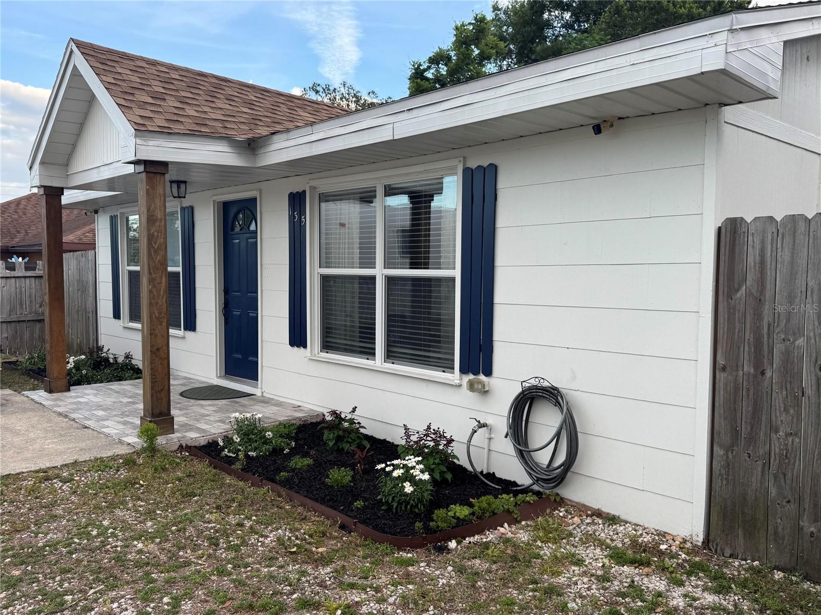 Welcome to 135 Carroll Street, a charming ’57 American rancher located just steps away from Clermont's Waterfront Park and vibrant downtown! Inside, natural light pours in to a spacious great room from all sides, highlighting a cozy and functional floor plan made for low-maintenance, lakeside living. The rear wing boasts an updated bathroom with a glass-enclosed tub/shower combo as well as an ample master bedroom. Outdoors, the deep front and back yards promise endless possibilities for gardening and for growth, whether that takes the shape of a backyard cottage or even expanding the main house. Out back, the brick BBQ pit/smoker and fire pit will encourage you to enjoy Florida’s breezy evenings under the stars. This home has been meticulously maintained over the years, allowing you to start exploring the surrounding lakes the day you move in. A new roof was installed in 2022, a new HVAC system was installed in 2019, and the water heater was replaced in 2018. This is an exceptionally rare opportunity to plug in to Clermont’s walkable lifestyle in one of its oldest neighborhoods. Get ready to walk the lakefront parks, dine downtown, and enjoy Clermont’s weekend markets and festivals without getting into your car! Oh, and no HOA!
