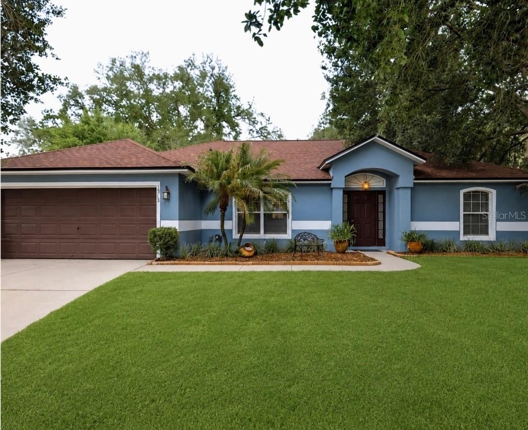 Welcome to 1313 Oak Valley Boulevard, a beautifully maintained 3-bedroom, 2-bath home offering 1,778 square feet of living space on an oversized .28-acre homesite in the heart of Minneola.

From the moment you enter, you’ll appreciate the soaring vaulted ceilings, open-concept design, and spacious layout that seamlessly connects the living, dining, and kitchen areas. The kitchen features stainless steel appliances, abundant cabinetry, generous counter space, and a center island ideal for entertaining and everyday living.

The split-bedroom floor plan offers privacy, while the spacious primary suite includes dual vanities, a soaking tub, separate shower, and walk-in closet. Additional bedrooms provide flexibility for guests, family members, a home office, or hobby space.

Recent updates and thoughtful finishes throughout create a move-in ready opportunity. Additional features include an interior laundry room, ample storage, and a two-car garage.

Situated on nearly a third of an acre, the property offers plenty of outdoor space for entertaining, gardening, recreation, or future enhancements. The mature landscaping and wooded backdrop provide a peaceful setting and additional privacy.

Conveniently located near Lake Minneola, Waterfront Park, the South Lake Trail, downtown Clermont, shopping, dining, healthcare facilities, and the Florida Turnpike, this home offers easy access to Orlando while enjoying the charm and lifestyle of Lake County living.

Whether you’re searching for a primary residence, relocating to Central Florida, or looking for additional space both inside and out, this home is ready for its next owner.
