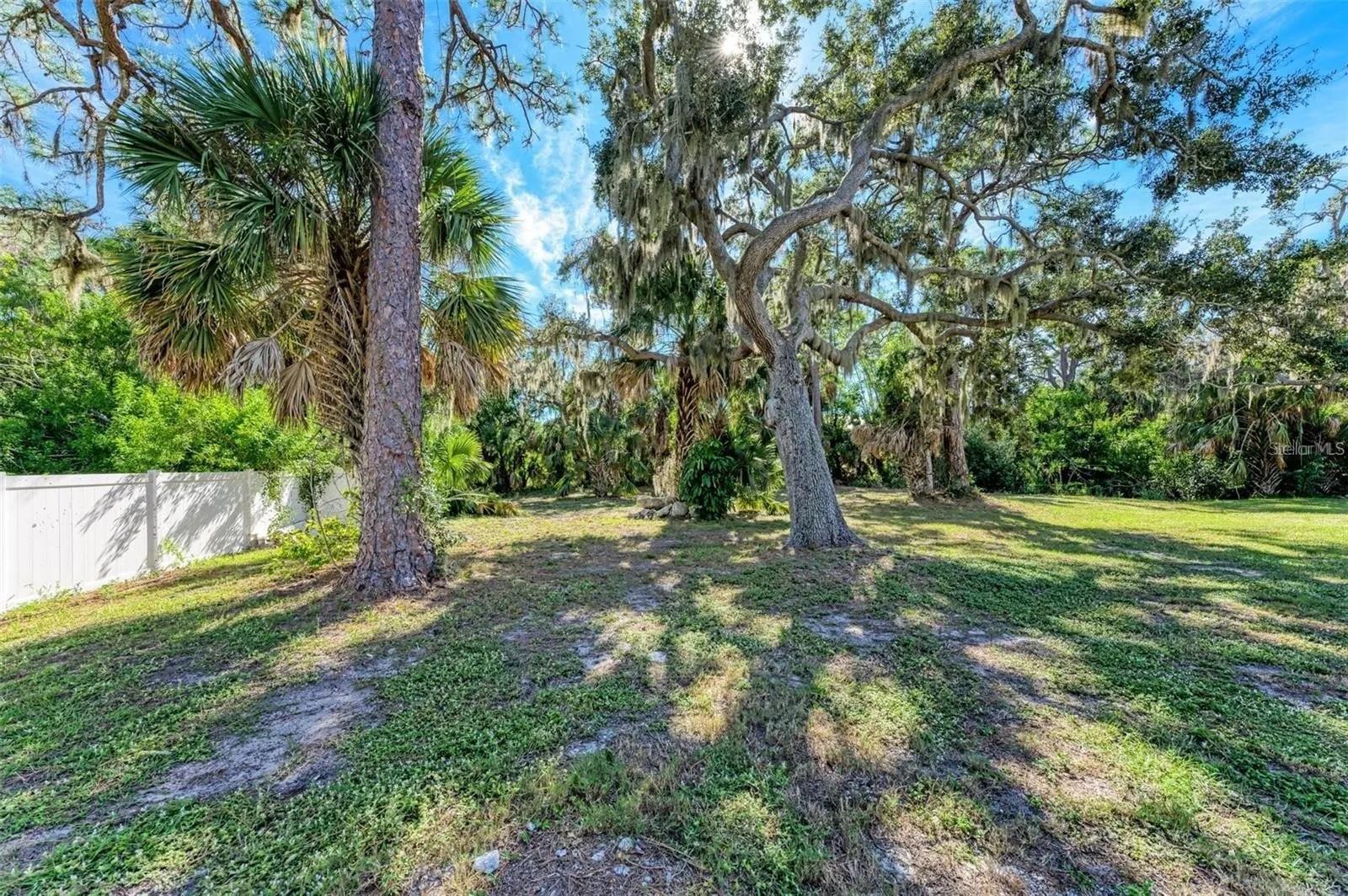 Exceptional opportunity to secure a private 0.54-acre homesite located among established multi-million-dollar properties and second in line from the peaceful waters of Blackburn Bay.
This rare parcel offers outstanding privacy, backing directly to a beautiful natural hammock preserve that will not be developed, creating a serene and protected backyard setting with mature vegetation and natural surroundings. The preserve provides long-term privacy and a peaceful backdrop rarely found this close to the water.
The lot is build-ready with recorded driveway and septic easements in place.
A conceptual design has been prepared for a thoughtfully planned 3,300 square foot coastal residence featuring 5 bedrooms plus office, 5 bathrooms, 3-car garage, pool, and seamless indoor-outdoor living.
Construction to be completed exclusively by Omkal Construction Inc (CRC1331614), a local builder specializing in custom homes and high-end residential construction in the Sarasota–Nokomis–Venice area.
The builder recently completed a custom residence on the adjacent lot, demonstrating the level of craftsmanship and quality that can be expected. Photos and details of the completed home are available in MLS #TB8413685.
Ideally located near Nokomis Beach, South Jetty Park, Gulf Harbor Marina, Legacy Trail, shopping, dining, Sarasota Memorial Hospital (Venice), and zoned for Laurel Nokomis School (Pre-K–8) and Venice High School. Convenient access to both Downtown Venice and Sarasota.
Financing options may be available for qualified buyers for both the land purchase and construction of the home.
A rare opportunity to build a custom coastal residence in a private bay-area setting with an experienced local builder renowned for exceptional craftsmanship and signature architectural style.