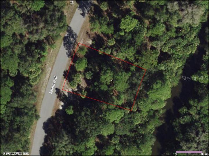 Beautiful, wooded, freshwater canal lot located in the heart of North Port. Drink your morning coffee, kayak, paddleboard, or watch gorgeous Florida sunsets from your very own back yard waterway. If you are thinking of building or investing in real estate, this may be the perfect property for you. Close to boating, fishing, shopping, beaches, restaurants, schools, public boat ramps and area attractions.  Adjacent lot (78) is available for sale on a separate listing.