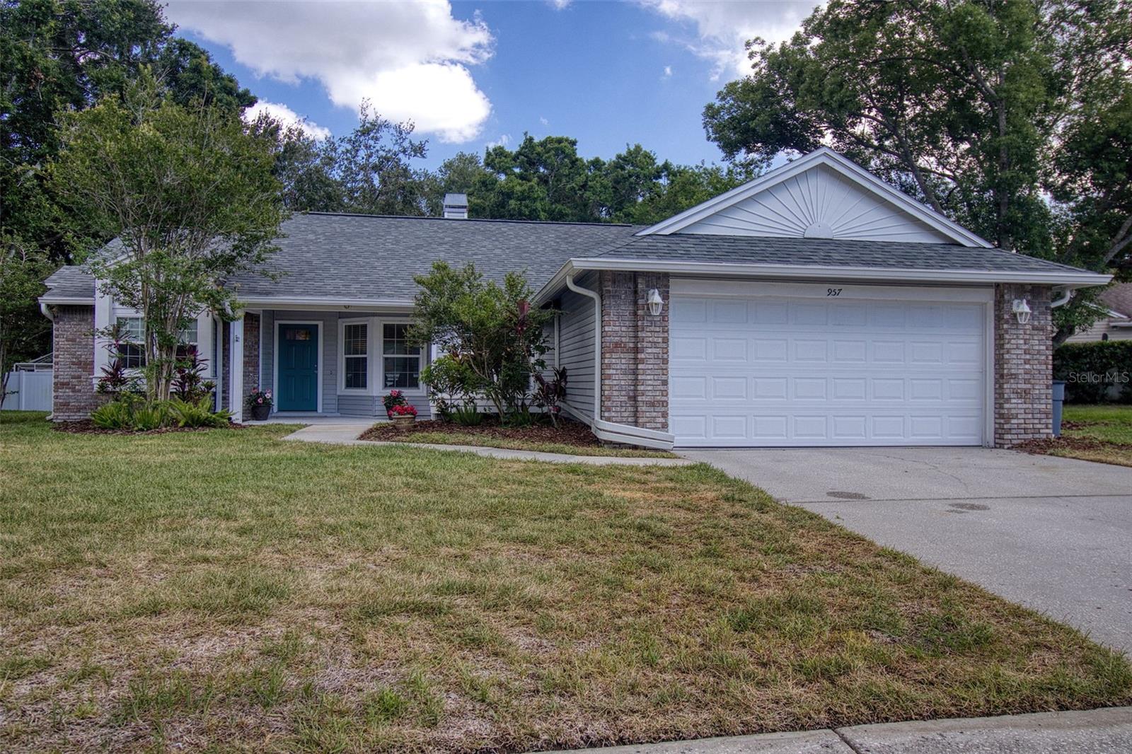 BRAND NEW ROOF! HOME RE-PLUMBED! BEAUTIFULLY RENOVATED!  This stunningly beautiful pool home featuring 3 bedrooms, 2 bathrooms and a 2-car garage is located in the desirable Deep Springs neighborhood in Palm Harbor on an oversized 1/4+ acre lot. This light and bright home features a spacious living room with Cathedral ceilings and a 2-sided wood burning fireplace.  The newer kitchen is stunning; featuring white quartz with gold vein countertops and backsplash and gold accessories, white 42 " cabinetry, newer stainless-steel appliances and the piece de resistance is a beautiful large island that opens up the kitchen to the living area and shares the same stunning aesthetic, with the added pop of royal blue cabinetry. The kitchen has a sweet nook with built in bench seating and lots of natural light.  The dining room opens to the kitchen and shares the other side of the wood burning fireplace and opens to the screened patio and pool via French doors, creating a seamless blend of indoor/outdoor living.  The primary bedroom is split from the other 2 bedrooms for privacy.  It also features high ceilings and a renovated ensuite bathroom with travertine tiles, a large walk-in shower and a generous walk-in closet.  This homes modern aesthetics and clean lines include; modern light fixtures, neutral paint, luxury vinyl floors throughout, spacious and well-designed kitchen and eat in spaces, newer stainless steel appliances, updated bathrooms; all done with elegance and great taste.  This pristine home also has impact windows (2013), a whole house Generac generator (2018), A/C (2025), plumbing (2022), and a brand-new Roof (2026).   Couple this with excellent schools, close to shops, restaurants, beaches and airports, you have the quintessential Florida Lifestyle Home.