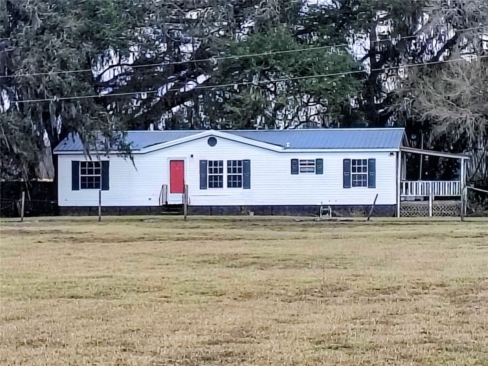 Situated on five beautiful acres, this country property offers the perfect blend of privacy and potential. Bring your horses, farm animals, and even your honey bees. The land is fully fenced and cross-fenced with multiple gates for easy access, plus water spigots conveniently located throughout the pastures. Two separate paddocks connected by gates, perfect for rotating and managing grazing animals with ease.

The 3-bedroom, 2-bath home features a newer metal roof (permitted 7-14-20) and a charming side porch, ideal for enjoying peaceful pasture views. With some updates and fresh paint, this property presents a great opportunity for buyers to personalize the space and build instant value.

Located just minutes to the Withlacoochee State Forest, Richloam Wildlife Management Area entrance, you’ll enjoy endless opportunities for riding, hiking, and exploring nature right nearby.

A chance to own acreage in a prime rural location with room to grow awaits.

Minutes from SR 50 and SR 471, making I-75 just a drive away. 

An Equal Housing Opportunity.