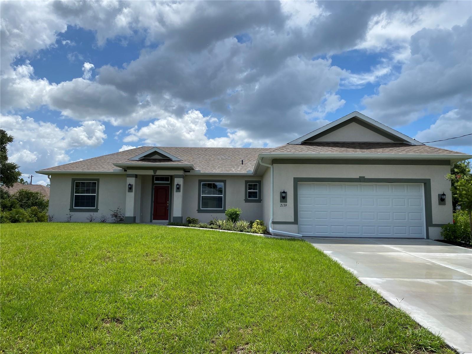 MAJOR PRICE REDUCTION!!! New construction. Move in ready. Open/split floor plan. Granite Countertops and soft close cabinets and drawers. Kitchen has a breakfast island with plenty of cabinets and counter space. 9'4" ceilings. A separate laundry room with cabinets and a granite countertop convenient for folding laundry. The home has a combination of ceramic tile and carpet. This home features a spacious primary bedroom that is approximately 14x15. Primary bathroom has granite countertops, dual sinks, garden bathtub and separate walk in shower. Home has GE appliances which includes Dishwasher, Range and microwave.