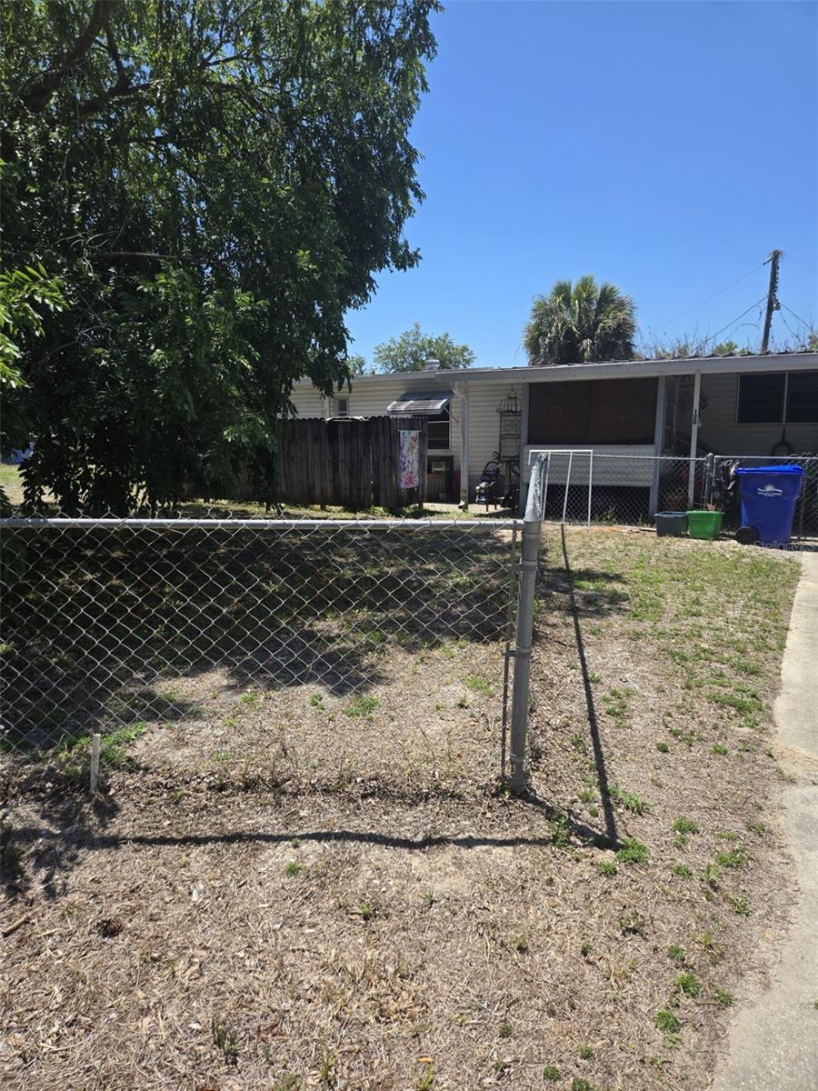Here is a great opportunity to own a mobile home on your own land with no HOA!  Adorable 1 bedroom, 1.5 bath on large fenced-in corner lot. Covered front porch for enjoying your morning coffee with the early morning breezes and covered back porch for a relaxing evening at home. 
Great location with nearby boat ramp, local seafood restaurant on the river and fishing. Short distance to shopping, major roads and more. Perfect spot to call home or for that much needed weekend getaway at a great price. All information is deemed accurate. Measurements are approximate. Buyers and or buyers agent to verify all and any information.