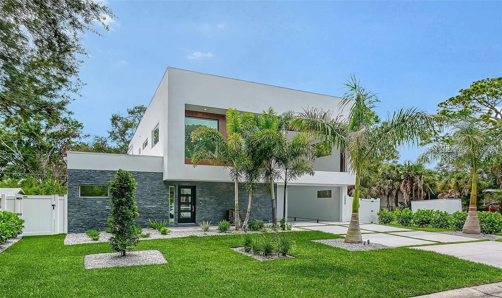 Some homes impress. This one creates a lifestyle. Thoughtfully designed for the way todays families live, this exceptional 3,991 sq. ft. contemporary residence offers 5 bedrooms, 6 full bathrooms, a private office, and a flexible second-floor bonus room perfect as a game room, gym, or media lounge. Every detail was designed with comfort and connection in mind. The open-concept floor plan is filled with natural light and flows effortlessly into a private outdoor retreat featuring a saltwater pool and spa, outdoor grill, covered lanai, and spacious backyard with room for children, pets, and unforgettable family gatherings. Located in Arlington Park, one of Sarasota's fastest-growing and most desirable neighborhoods, this home offers more than luxury, it offers a lifestyle. Tree-lined streets, beautiful parks, highly rated schools, and a welcoming sense of community have made Arlington Park one of the city's  premier destinations for new construction. Enjoy the convenience of being just minutes from Southside Village, Sarasota Memorial Hospital, downtown Sarasota, Siesta Key, and Lido Key, while coming home to a neighborhood that continues to grow in value and demand. With striking modern architecture, expansive indoor-outdoor living, a covered carport, premium finishes, and thoughtfully designed spaces throughout, this home stands out as one of Arlington Parks most distinctive new residences. Come experience the lifestyle, design, and quality that make this home truly unforgettable.