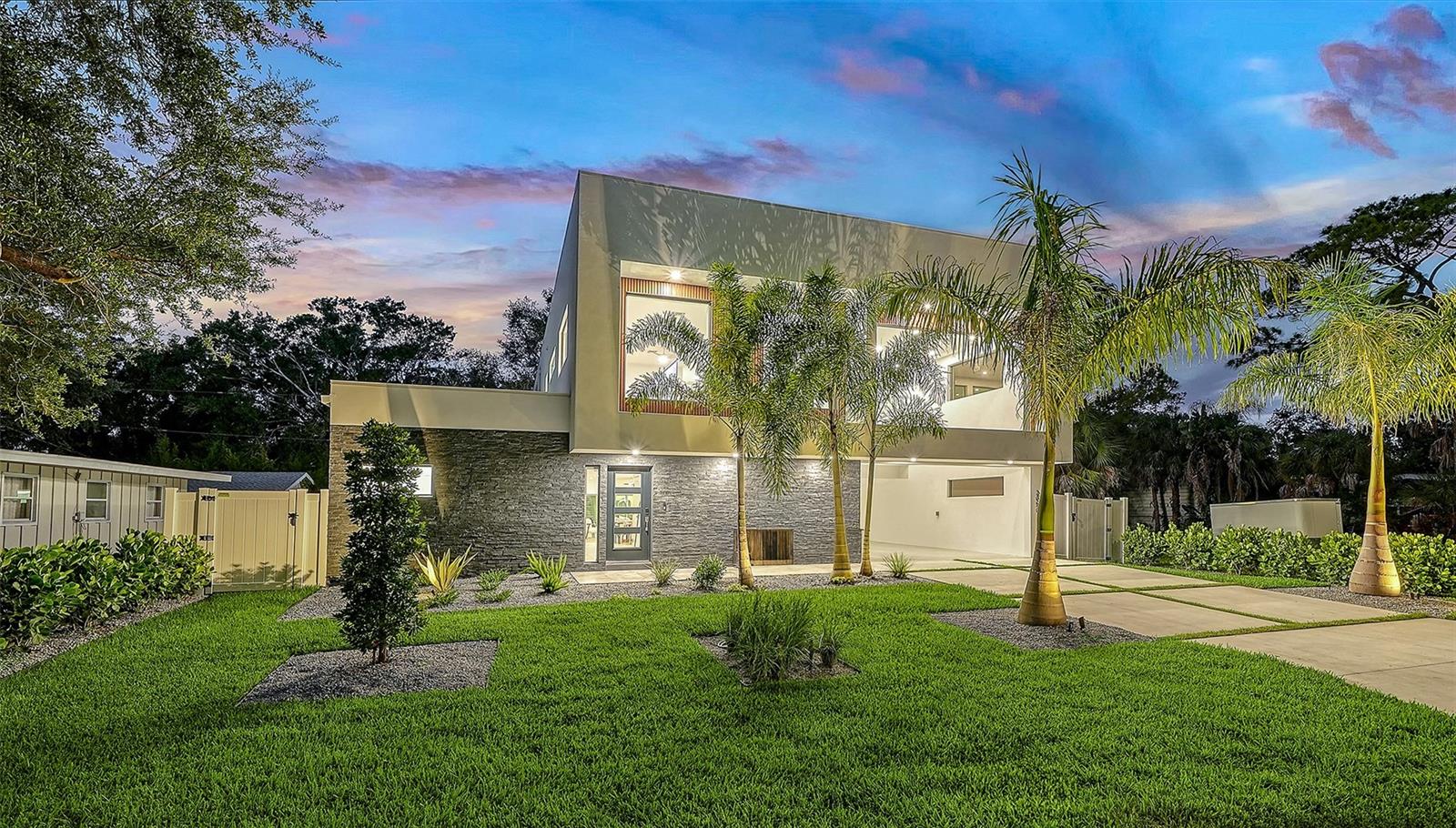 Some homes impress. This one creates a lifestyle. Thoughtfully designed for the way todays families live, this exceptional 3,991 sq. ft. contemporary residence offers 5 bedrooms, 6 full bathrooms, a private office, and a flexible second-floor bonus room perfect as a game room, gym, or media lounge. Every detail was designed with comfort and connection in mind. The open-concept floor plan is filled with natural light and flows effortlessly into a private outdoor retreat featuring a saltwater pool and spa, outdoor grill, covered lanai, and spacious backyard with room for children, pets, and unforgettable family gatherings. Located in Arlington Park, one of Sarasota's fastest-growing and most desirable neighborhoods, this home offers more than luxury, it offers a lifestyle. Tree-lined streets, beautiful parks, highly rated schools, and a welcoming sense of community have made Arlington Park one of the city's  premier destinations for new construction. Enjoy the convenience of being just minutes from Southside Village, Sarasota Memorial Hospital, downtown Sarasota, Siesta Key, and Lido Key, while coming home to a neighborhood that continues to grow in value and demand. With striking modern architecture, expansive indoor-outdoor living, a covered carport, premium finishes, and thoughtfully designed spaces throughout, this home stands out as one of Arlington Parks most distinctive new residences. Come experience the lifestyle, design, and quality that make this home truly unforgettable.