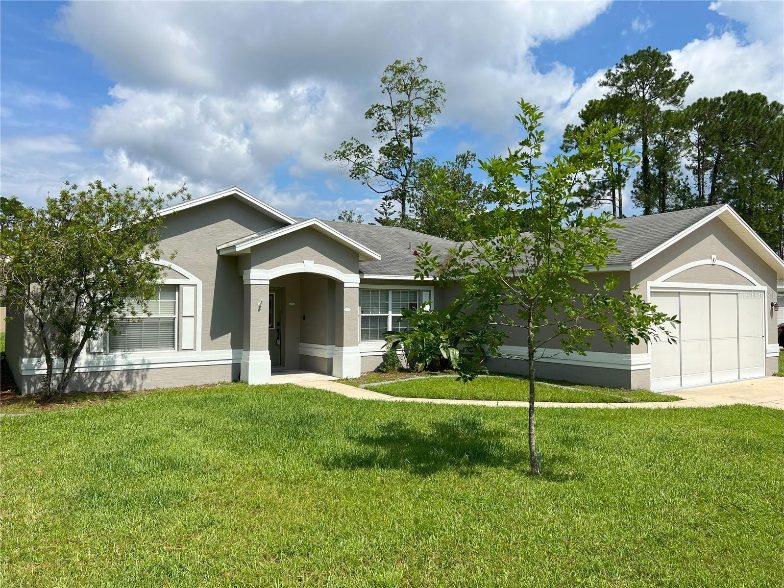 *NEW ROOF COMING NOV. 2023* A/C 2021! RECENT PRICE ADJUSTMENT! You’ll be thoroughly pleased with this well-maintained home located in the highly sought-after Indian Trails community. There are many desirable features that this home boasts. Inside, notice the open-concept living room and dining room, allowing for flexibility in furniture arrangements to best suit your wants and needs. The owner’s suite is tucked away, opposing the other bedrooms (split-floorplan) for maximum privacy and comfort from guests or other family members. The kitchen overlooks the dinette area, which holds a view of the home's spacious, screened-in lanai. The oversized backyard is one that many dream of! There is a plentiful amount of space to add a pool, shed, or whatever you desire. The quiet street in which this home is stationed is within proximity to everything you could want or need; restaurants, shopping centers, schools, the beach, and more! You won’t want to miss the opportunity to make this stunning home yours. Schedule your showing today!