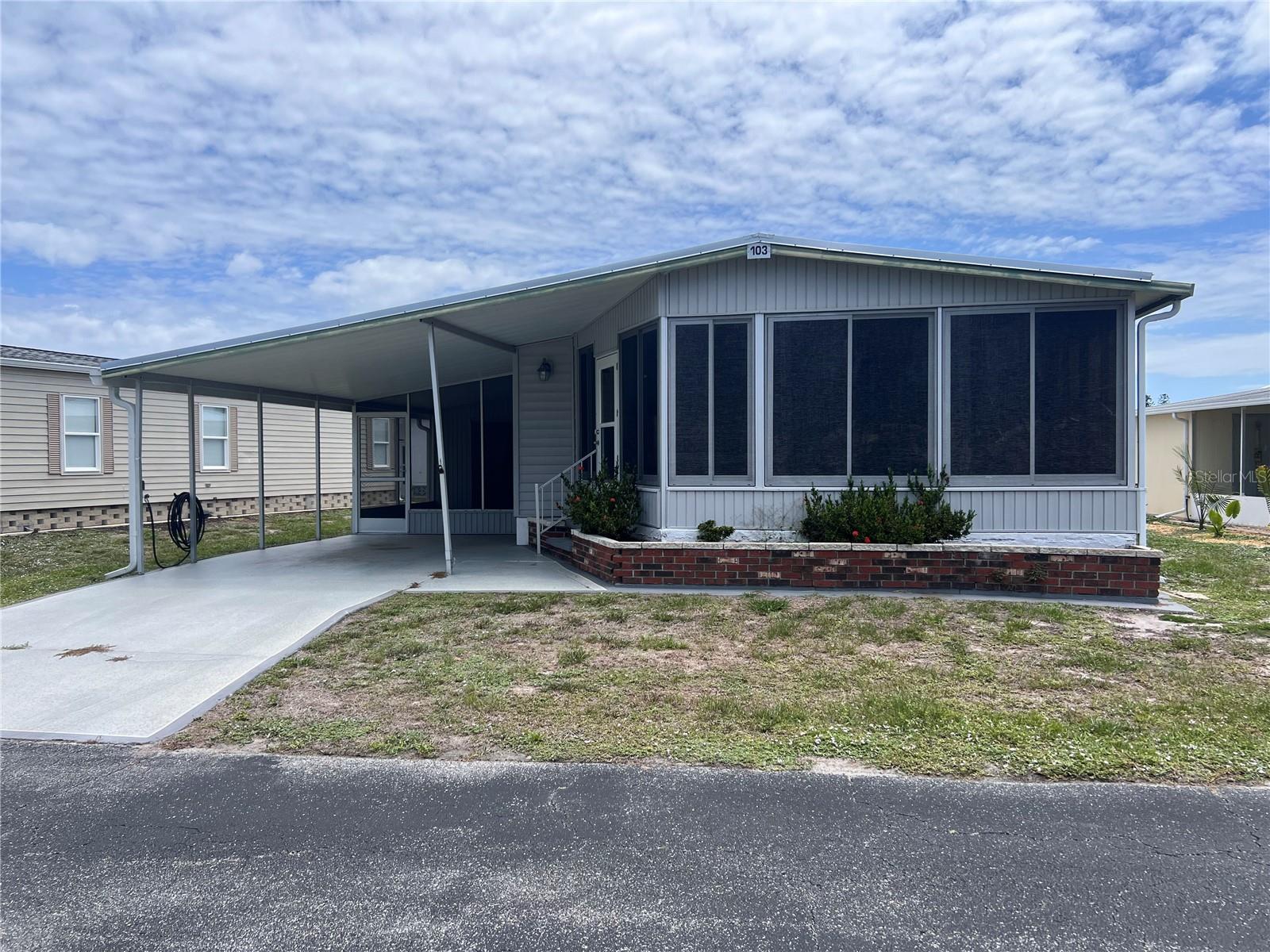 Welcome to Polynesian Village, a desirable resident-owned 55+ community in beautiful Englewood, Florida! Conveniently located near pristine Gulf beaches, local restaurants, shopping, the flea market, golf courses, medical facilities, and historic downtown Englewood, this hidden gem offers the perfect blend of convenience and privacy.

This 2 bedroom, 2 bathroom home is being offered unfurnished and features a covered carport, an attached shed( laundry room), screened lanai, and an enclosed sunroom, providing plenty of space to relax and enjoy the Florida lifestyle. The home could benefit from a little TLC but is move in ready and full of potential. All measurements and details to be verified by agent and buyer

Polynesian Village is an active community of 246 manufactured homes where residents enjoy a friendly atmosphere and an abundance of amenities. The community features an onsite manager, a clubhouse with a library and full kitchen, shuffleboard courts, and a heated swimming pool with sundeck. Additional onsite storage is also available for a fee. Pet friendly with restrictions.

Tucked away from the hustle and bustle, yet close to everything you need. Come discover why Polynesian Village is one of Englewood’s best-kept secrets