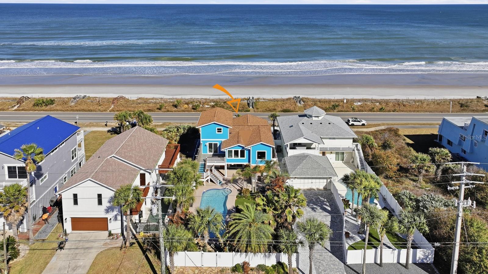 From A1A to Central Avenue, this oceanfront residence offers refined coastal living paired with exceptional construction and lasting durability. The property feels like a private retreat while offering ideal entertaining space with three front parking spaces and three additional in the rear, plus deeded private beach access directly in front of the home.

Featuring 4 bedrooms and 3 full baths, the home showcases unobstructed Atlantic views and true beachfront living in the heart of Flagler Beach. A full 2020 remodel highlights quality craftsmanship and modern coastal finishes, with updated electrical and plumbing throughout.

Designed for both comfort and resilience, the home includes quartz surfaces, a private primary suite with coffee bar and mini fridge overlooking the ocean, impact-rated “turtle glass” windows, whole-house generator, natural gas, Hardie board siding, 2017 roof, built-in AC dehumidifier, French drain system, and privacy fencing.

Outdoor living is elevated with a 40-foot saltwater pool, remote-controlled fountain, outdoor kitchen, irrigation system, GFCI outlets throughout, Florida native landscaping, and low-maintenance turf for effortless upkeep.

Additional highlights include littoral rights, a main-level suite with accessibility features, elevated laundry storage, security system, and seamless indoor-outdoor flow. A rare opportunity to own a fully upgraded oceanfront property built for luxury, lifestyle, and longevity in Flagler Beach.