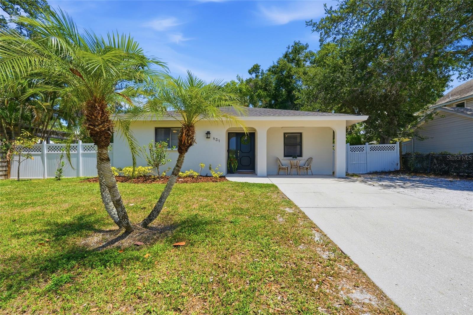 Welcome to Indian Beach Sapphire Shores, one of Sarasota's most distinctive and sought-after neighborhoods. Known for its eclectic architecture, artistic character, mature canopy roads, and picturesque bayfront parks, this is a community where neighbors stroll to sunsets, and every street tells a story. Just minutes from downtown Sarasota and The Ringling, and surrounded by bayfront parks and historic streetscapes, this move-in-ready 3-bedroom, 2-bathroom home offers a lifestyle that is uniquely Sarasota. Inside, a bright and functional floor plan features tile and hardwood flooring throughout, abundant natural light, and a well-appointed kitchen with stainless steel appliances and generous white cabinetry, creating an inviting space for everyday living. Step outside to enjoy a screened lanai overlooking the fenced backyard, offering plenty of space for entertaining, gardening, creating a play area, or adding a pool. Meticulously maintained and ready for its next owner, this home presents a rare opportunity to enjoy the lifestyle that has made Indian Beach Sapphire Shores one of Sarasota's most beloved neighborhoods, with easy everyday enjoyment supported by its features. Discover why so many residents fall in love with Indian Beach Sapphire Shores, and imagine yourself enjoying all it has to offer.