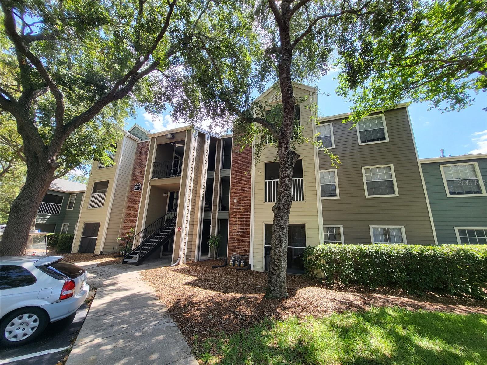 PARK CENTRAL in Orlando 32839. Centrally Located!!! GATED COMMUNITY.  2 Bedrooms and 2 Bathrooms TOP UNIT!!!! High Ceilings. Screen in Balcony!!!! LAMINETED WOOD floors. Slip Floor plan. Spacious Family room, OPEN KITCHEN. Both rooms with walk in closets. Laundry room with Full size Washer and Dryer included. Water, Sewer and Valet Trash included in with the HOA. Community features: 5 pools, huge gym, lake, indoor basketball, convenient store, restaurant & more.