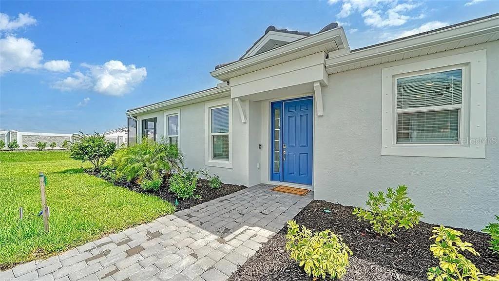 Move-in ready villa with an expanded lanai, flexible guest space, and close proximity to the clubhouse in one of the most desirable resort communities in Lakewood Ranch. Located in Esplanade at Azario, this beautifully maintained IBIS floor plan offers 2 bedrooms, a den with a built-in Murphy bed, and a 2-car garage, providing lock-and-leave convenience and versatile space for visiting family and friends. Step inside to a bright, open-concept layout featuring elegant 24x24 tile flooring throughout the main living areas and generous recessed lighting that enhance the light and airy feel. The designer kitchen showcases popular shaker-style cabinetry, stainless appliances, and flows seamlessly into the dining and living areas—perfect for entertaining or relaxed everyday living. The private primary suite serves as a comfortable retreat with a large walk-in closet, dual-sink vanity, spacious walk-in shower, and private water closet. A guest bedroom with an attached bath is thoughtfully positioned at the front of the home, creating privacy for visitors. The versatile den with Murphy bed
easily transitions from a home office or study to additional guest sleeping space when needed. Enjoy morning coffee or evening relaxation on the expanded lanai, a perfect spot to unwind and enjoy Florida’s beautiful weather. One of the home’s standout advantages is its convenient location near the community clubhouse, making it easy to enjoy the exceptional amenities at Esplanade at Azario. Residents have access to scenic walking trails, beautifully landscaped parks, a state-of-the-art fitness center, resort-style pool and spa, pickleball and tennis courts, and poolside dining at the Bahama Bar. Golf enthusiasts can also experience the championship course at Esplanade Golf and Country Club, where membership is optional with pay-to-play access available. Located in award-winning Lakewood Ranch, consistently ranked the #1 multi-generational master-planned community in the U.S., you’ll be just minutes from top shopping, dining, entertainment, and the beautiful Gulf Coast beaches. Start enjoying the Florida lifestyle immediately in this thoughtfully designed
villa that blends comfort, flexibility, and resort-style living.
