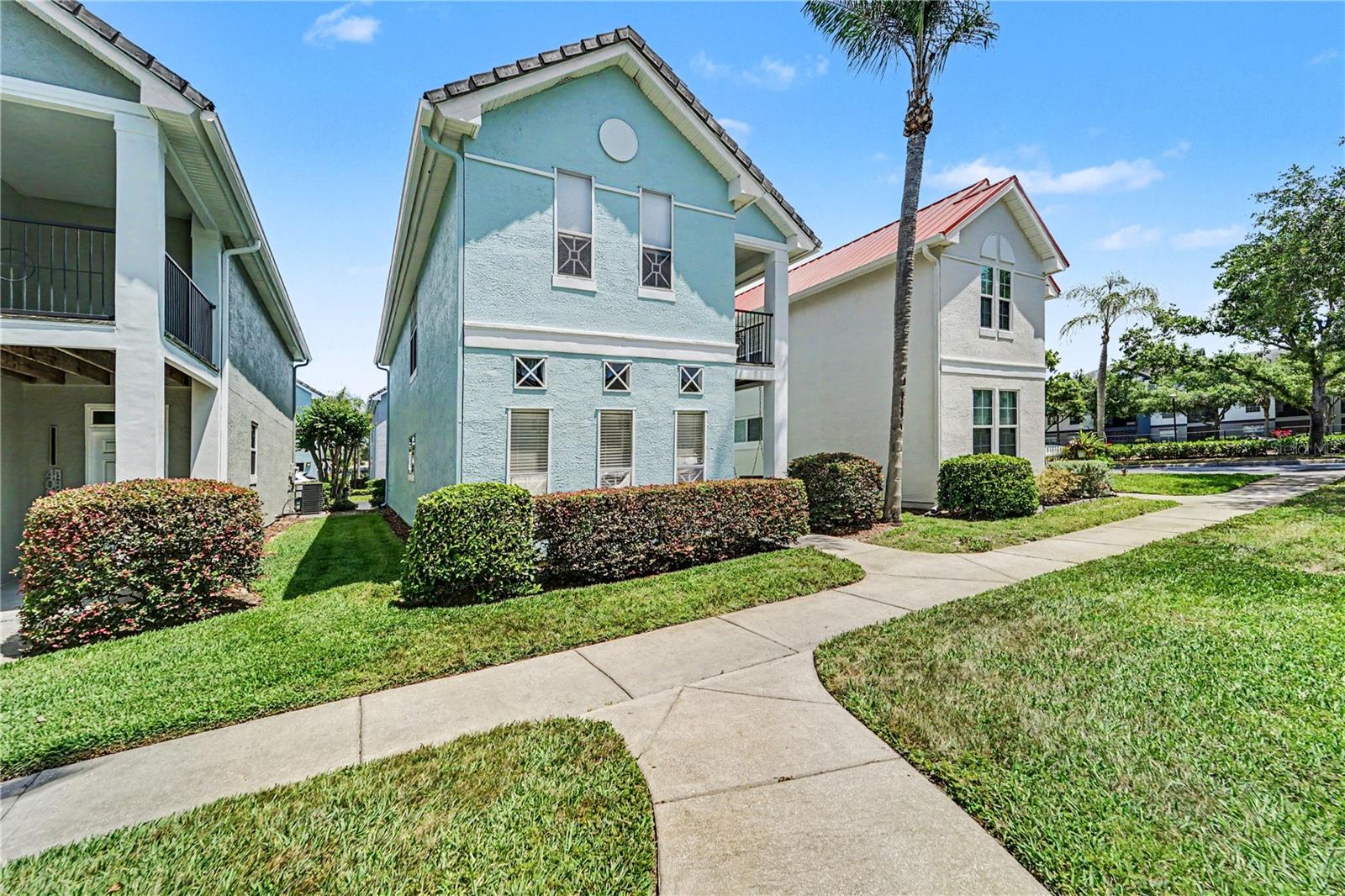 Back on the market at no fault of the seller or the home! Welcome to 4004 Lady Palm Ct, a rare opportunity to own a beautifully appointed detached townhome in the highly sought-after gated community of Villas at Carrollwood. Offering 1,724 square feet of thoughtfully designed living space, this 4-bedroom, 2.5-bath residence features a 2-car garage, rich hardwood floors, an updated kitchen with modern finishes, and a spacious, functional layout ideal for everyday living. Originally built as the community's model home, this residence showcases premium windows that fill the interior with abundant natural light, creating a bright and inviting atmosphere throughout. The expansive primary suite offers a private balcony, providing the perfect space to enjoy your morning coffee or unwind in the evening. Residents enjoy a low-maintenance lifestyle with exceptional community amenities, including a resort-style pool, tennis courts, dog park, playground, and beautifully maintained grounds. Ideally located near Carrollwood Village, Whole Foods Market, Sprouts Farmers Market, Publix, dining, shopping, and Tampa International Airport, this home offers the perfect blend of comfort, convenience, and one of Tampa's most desirable gated communities.