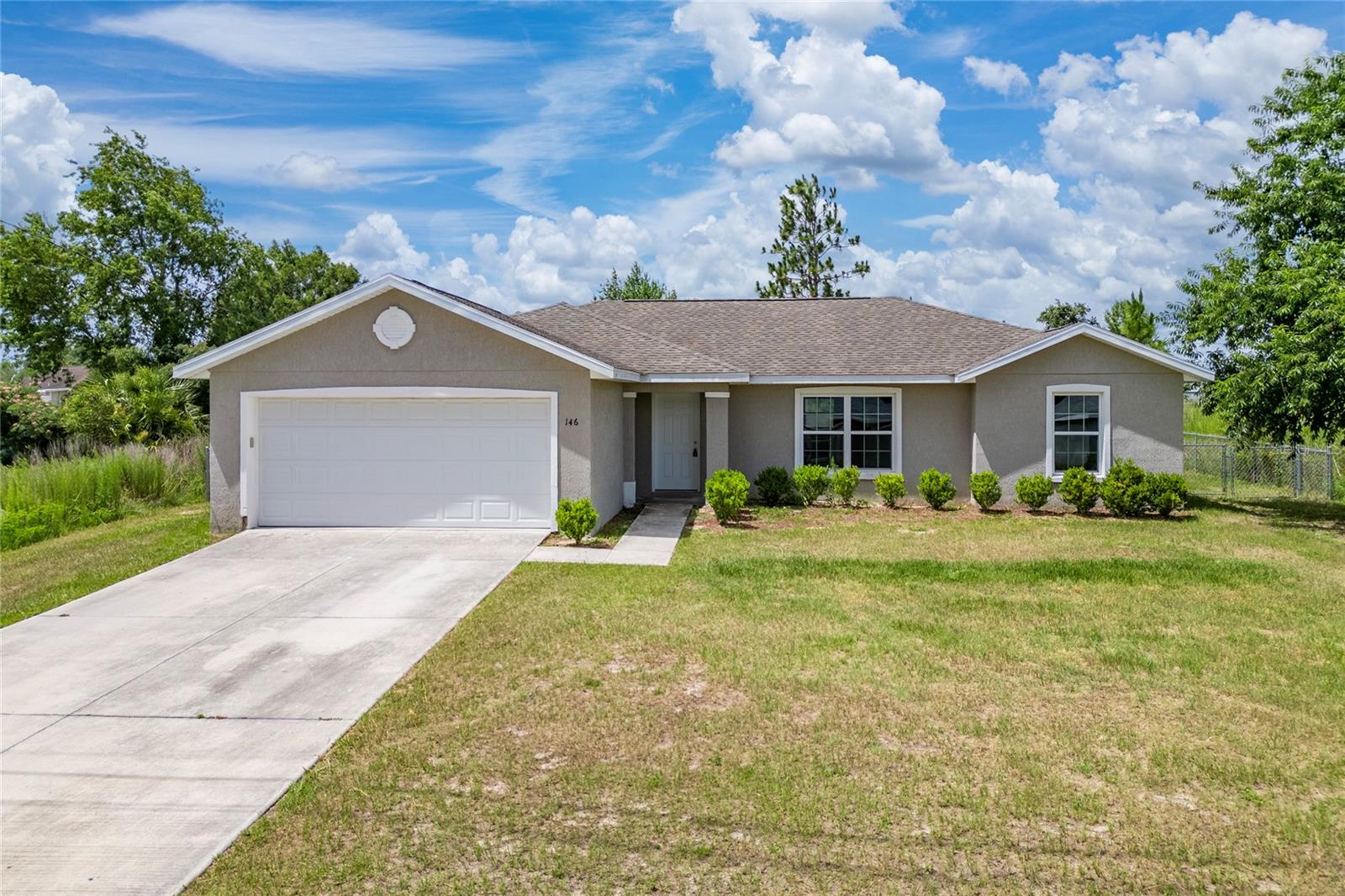 Be the first to live in this 2019 ARCADIA MODEL! 3/2/2 Split and open
floor plan with over 2,000 Sf under roof and over 1,500 Sf of living space. Spacious rooms and plenty of storage space. UPGRADES - LVT and
carpet flooring, Wood Kitchen Cabinets, Full Stainless Steal Appliance Package, Energy Efficient LOW-E windows with easy cleaning pull downs.
LED lighting throughout. Master bedroom has a walk in closet, bath with awalk in shower and dual sinks. Inside laundry room & much more!
Great location near schools, parks, shopping & more! Leisure drive to The Villages and conveniently located near shopping and dining