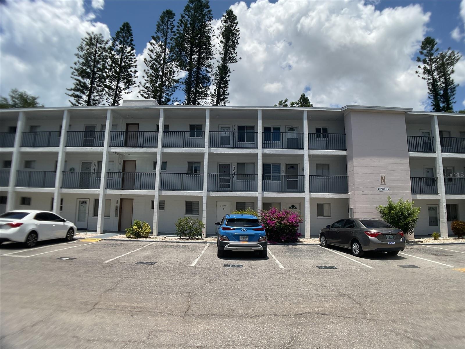 Charming and affordable resort-style living awaits you in this desirable 55+ maintenance-free community! Welcome to this lovely 1-bedroom, 1-bathroom second-floor CORNER unit nestled in Third Bayshore Gardens. Boasting extra privacy and wonderful natural light, this unit features a spacious living layout and a functional kitchen perfect for easy living. The low monthly condo fee is a phenomenal value, covering your cable, internet, water, sewer, trash, exterior maintenance, and escrow reserves. Step outside your door to enjoy the fantastic community amenities, including a pristine heated swimming pool and an active clubhouse with plenty of social events. Location is everything—you are just minutes from dynamic downtown Bradenton, premier shopping, dining, and the breathtaking Gulf beaches. Please note that this association maintains a strict no-pets and no-leasing policy for new owners, ensuring a peaceful and stable neighborhood environment. Perfect as a winter getaway or a year-round retreat. Schedule your private showing today and start enjoying the Florida sunshine!