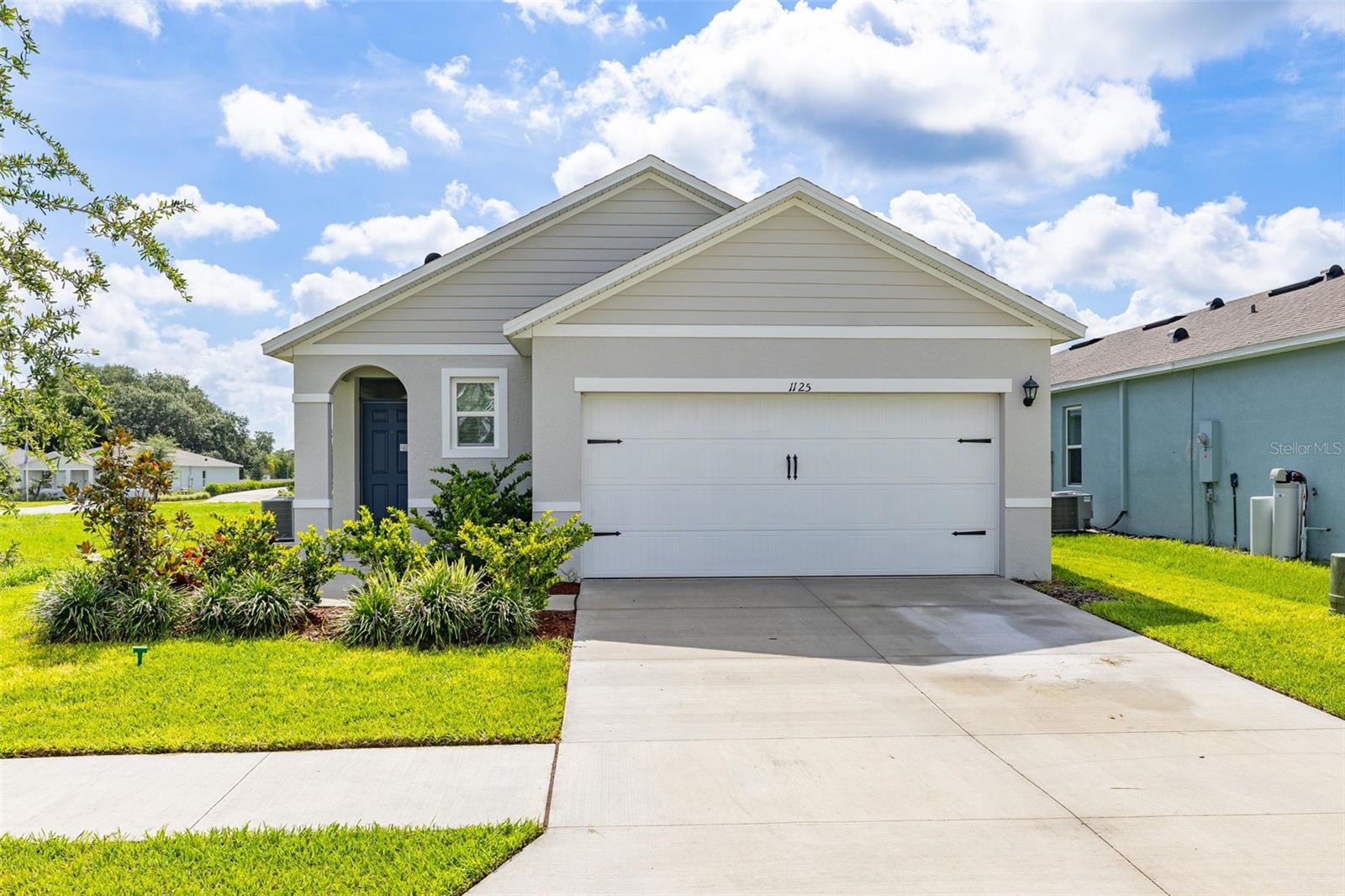 Special Incentive Available through Sellers Preferred Lender. Welcome to this beautifully maintained 3 bedroom, 2 bathroom home with a 2-car garage, located in the desirable Bradbury Creek community in Haines City. Built in 2024, this move-in ready home offers a modern open floor plan designed for comfortable everyday living and effortless entertaining.

The spacious kitchen features granite countertops, ample cabinet space, and overlooks the living and dining areas, creating the perfect gathering space. The home also includes a washer and dryer, making your move even easier.

Enjoy valuable upgrades completed by the owner, including a whole-house water softener and an irrigation system to help keep your lawn looking its best. With only two years of age, this home offers the benefits of newer construction without the wait.

Conveniently located near shopping, dining, schools, and major roadways, Bradbury Creek is a growing community that offers a peaceful setting with easy access to everything Central Florida has to offer. Don't miss this opportunity to own a like-new home - schedule your private showing today!