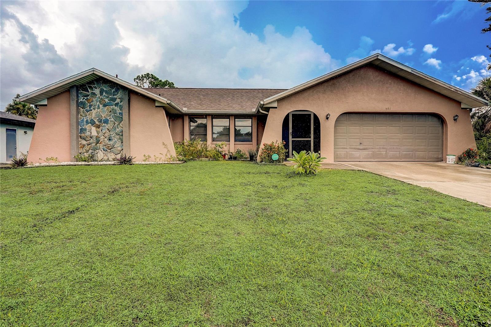 Introducing a charming 3-bedroom, 2-bath home in Port Charlotte, Florida, spanning an expansive 1900 square feet. This residence boasts a spacious living room, complemented by a generously-sized family room for ample gathering space. Enjoy the serene screened-in porch, perfect for outdoor entertaining. This home has been recently painted on the interior and the roof and AC were replaced this year!! Conveniently located near a variety of shops, restaurants, and dining options, this home offers both comfort and accessibility for its lucky new owners.