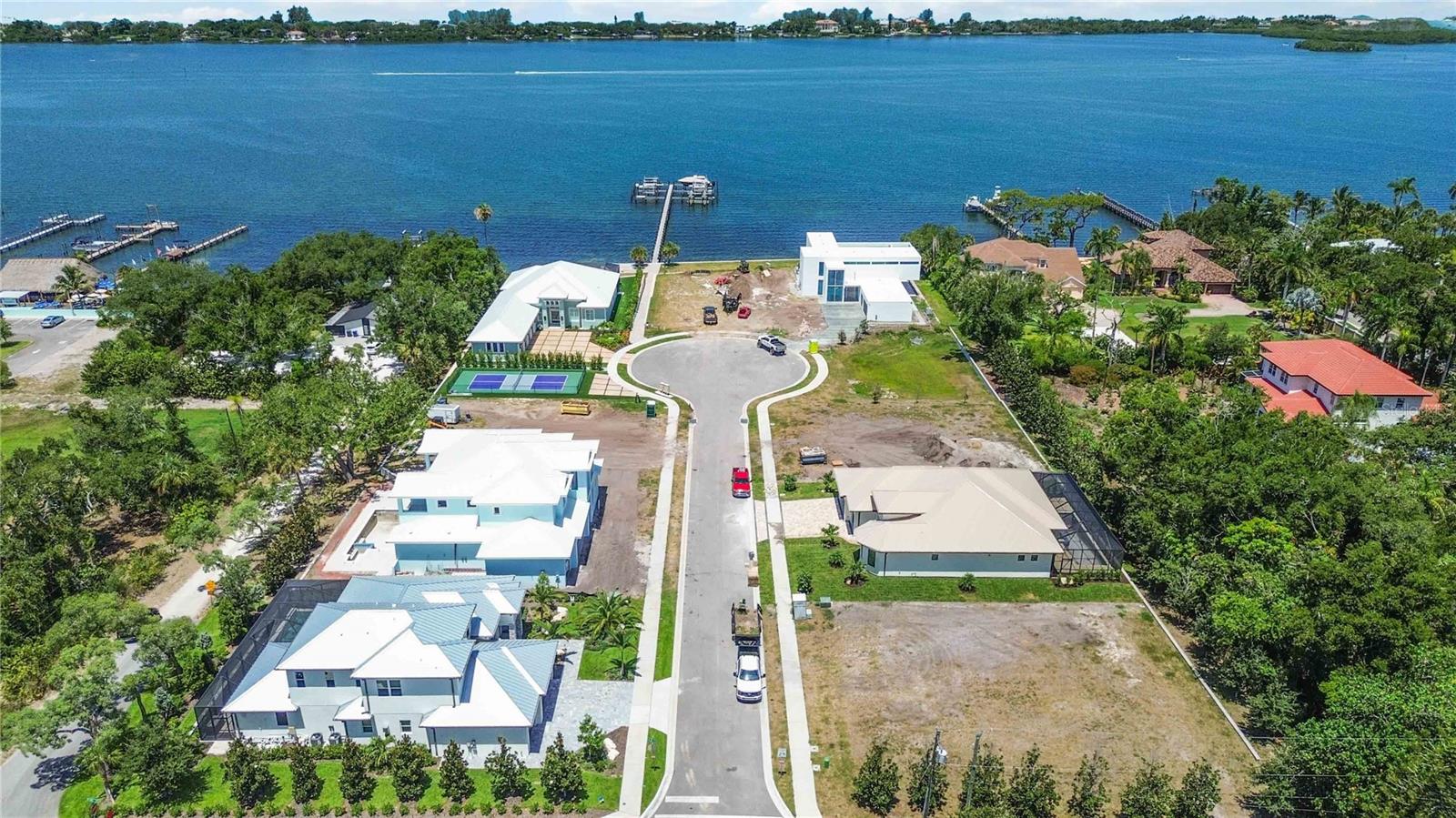 Build your dream home in one of Osprey's most exclusive waterfront communities. Nestled on a premium cul-de-sac homesite in the private enclave of Parrot Bay, this exceptional property is one of only nine custom home sites, offering a rare opportunity to create a truly personalized coastal retreat with the builder of your choice.

Included in the sale is a private boat dock that accommodates up to a 30-foot vessel, providing easy access to the Intracoastal Waterway and the Gulf of Mexico. Whether you enjoy boating, fishing, or simply watching the sunset from the water, this property offers the ultimate Florida waterfront lifestyle.

Parrot Bay is a boutique community designed for privacy and relaxation, complete with a community pickleball court and beautifully maintained surroundings. Ideally located between Sarasota and Venice, you're just minutes from Nokomis Beach, Siesta Key, Casey Key, waterfront dining, shopping, golf, and the area's best parks and attractions.

Opportunities to purchase a homesite with an included boat dock in a community this small and desirable are incredibly rare. Don't miss your chance to build the custom waterfront home you've always envisioned in one of Osprey's most sought-after locations.