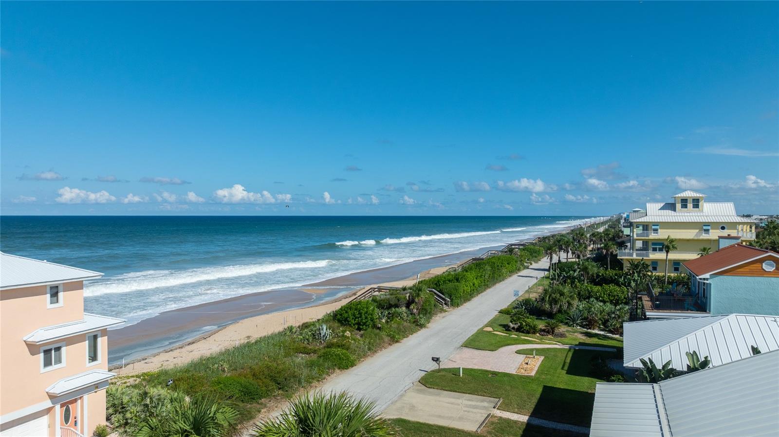 Virtually Staged. EXTRAORDINARY + RARE OPPORTUNITY to BUILD YOUR DREAM OCEAN-VIEW HOME in the highly sought-after Bethune Beach section of New Smyrna Beach. Unobstructed ocean view from 2nd + 3rd floor + Roof Deck. Whether you’re envisioning a stunning primary residence or the perfect coastal vacation retreat, this premier location offers the very best of beachside living. Nestled in one of the area’s most desirable pockets, this property places you just a short walk from the gorgeous sandy shoreline and breathtaking Atlantic Ocean views. ELECTRIC, WATER + SEWER INFRASTRUCTURE ALREADY IN PLACE! With no HOA, you’ll enjoy the freedom and flexibility to create the custom coastal home you’ve always imagined. Can add 2nd driveway entrance from A1A! Bethune Beach continues to be an incredibly popular destination for builders and buyers alike thanks to its laid-back charm, unbeatable location, and strong demand for luxury coastal homes. You’ll love being only about 10 minutes from the vibrant shops, restaurants, and entertainment of iconic Flagler Avenue while still enjoying the tranquility of this exclusive beachside community. Build your dream, embrace the beach lifestyle, and experience everything this exceptional New Smyrna Beach location has to offer.