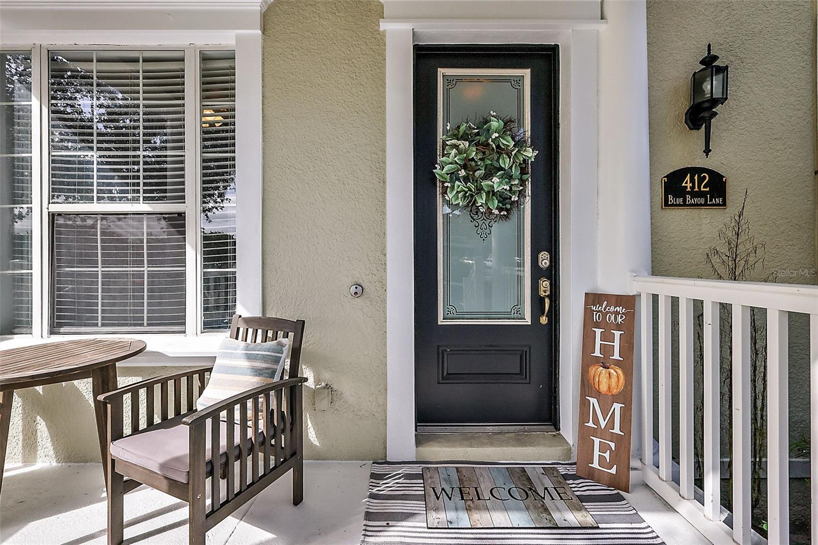 PRICED TO SELL - Quick move in available. Welcome to 412 Blue Bayou Lane in the highly desirable Jesups Reserve community, where elevated style, smart design, and an unbeatable Winter Springs location come together without the luxury price tag. This beautifully maintained 3-bedroom, 3-bathroom, three-story townhome offers low-maintenance living just steps from Winter Springs Town Center.

The flexible first-floor bedroom with full bath is ideal for guests, a home office, or multi-generational living. The main level features a bright open-concept living and dining area, an oversized kitchen with like-new stainless steel appliances, a generous breakfast bar, and convenient second-floor laundry. The private third-floor owner’s suite offers a large walk-in closet, en-suite bath with soaking tub and separate shower, and peaceful separation from the main living spaces.
Enjoy three outdoor living areas, including a welcoming front porch, updated second-floor patio, and private third-floor balcony perfect for relaxing evenings. Major updates include a new roof in 2022, new A/C in 2023, garage door maintenance in 2024, brand-new stair railing, and laminate flooring throughout with no carpet. The oversized 2-car garage with added storage solutions keeps everything organized and functional.

Jesups Reserve residents enjoy a resort-style community pool and spa, scenic pond views, and a well-kept neighborhood setting. The location is hard to beat – you’re minutes from Central Winds Park, Trotwood Park, with convenient access to shopping, dining and major likes like SR-417. This move-in-ready home delivers style, location, and value in one exceptional package. Move-in ready, meticulously maintained, and priced to sell—this is the opportunity buyers have been waiting for.