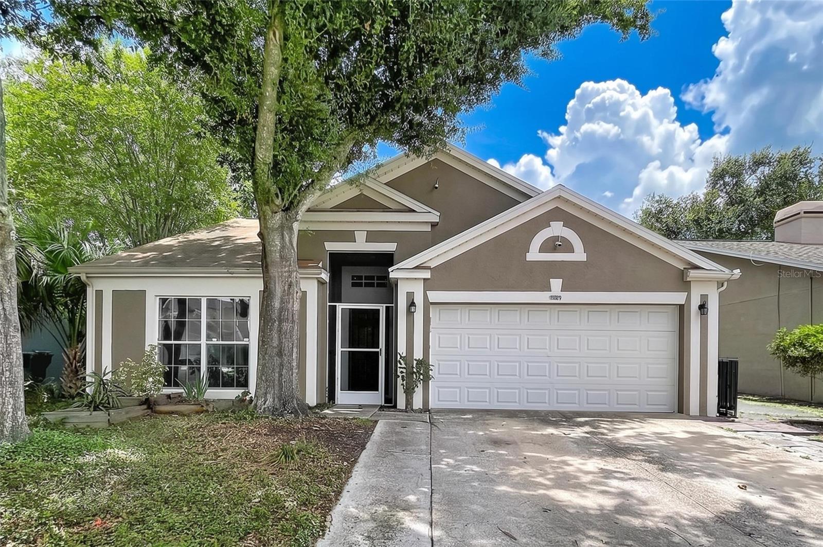 Tasteful updates inside, a backyard that pulls its weight outside. This home pairs smart interior refreshes with serious outdoor upside — two gazebos, pavers, a covered porch, and a private outbuilding ready to become your home office, wall-unit AC included. Add a solid Plantation location, and this one is what you've been looking for.
Inside, this 3-bedroom, 2-bathroom home offers an open floor plan with split bedrooms, giving everyone their own space. The kitchen opens straight into the living room, with counter space made for bar stools and easy conversation. Tile flooring runs through the living areas and both bathrooms, with luxury vinyl flooring in the bedrooms, and the primary bath has been updated with a new shower. Brand-new supply plumbing runs through the entire house, along with a whole-home water softener and a 2-car garage for storage and parking.
The backyard is your private oasis, with pavers and plenty of room for outdoor seating, grilling, or potted plants. Two gazebos offer shade throughout the day, and a covered porch makes for easy indoor-outdoor living. Tucked at the edge of the yard, a private outbuilding — complete with its own wall-unit air conditioner — is ready to be a home office, studio, or extra guest space.
The kitchen comes equipped with a stainless steel refrigerator and dishwasher, and the neighborhood adds even more value: community pool, tennis courts, and a playground, all within a quick drive of shopping and the airport.
Solid layout, real outdoor space, and a location that works.