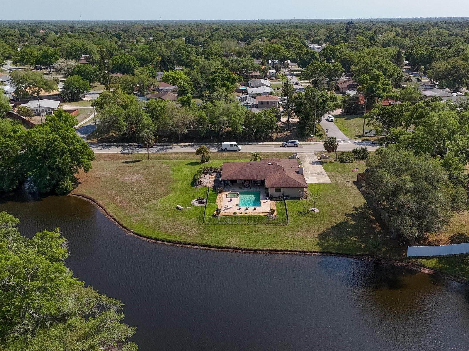 PRICE REDUCED!!!!Set on an expansive 1.06-acre lot, 3927 DeSoto Road in Sarasota offers a rare combination of space, privacy, and versatility. The oversized parcel provides endless possibilities—whether you envision lush landscaping, additional structures, or simply enjoying the open room to spread out.  At the heart of the outdoor space is a huge pool, perfect for entertaining, relaxing, or creating a true backyard retreat. With this much land surrounding it, the pool area feels private and resort-like, offering plenty of room for outdoor seating, dining, and recreation.
Inside, the home features a spacious interior layout with generous living areas designed for comfort and functionality. Large rooms, open flow, and abundant natural light create an inviting atmosphere that’s ideal for both everyday living and hosting guests.
This property stands out for its rare lot size, impressive outdoor amenities, and roomy interior, making it a unique opportunity in Sarasota for anyone looking for space without sacrificing convenience.  Home is located very close to UTC, Benderson Park and all local beaches and downtown Sarasota.