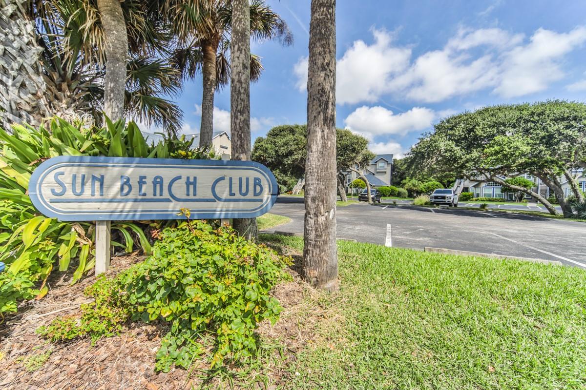 Charming first floor 2/2 Condo in the Sun Beach Club community. This unit offers lots of natural light while the living room offers an elegant fireplace and flows to the kitchen.  Spacious and comfortable condo in a peaceful and private setting directly across the street from a serene shoreline of the no-drive beach in New Smyrna Beach. Sliding doors lead to your private  patio. Sun Beach Club is designed for peace, privacy, and luxury. Bask in the sun on the pool deck or dine under the cover of the lanai. Splash in the seasonally heated pool or relax in the spa. Conveniently located and within walking distance to area restaurants, parks, and shopping. ;LocationDescription: Condo ;Water: City