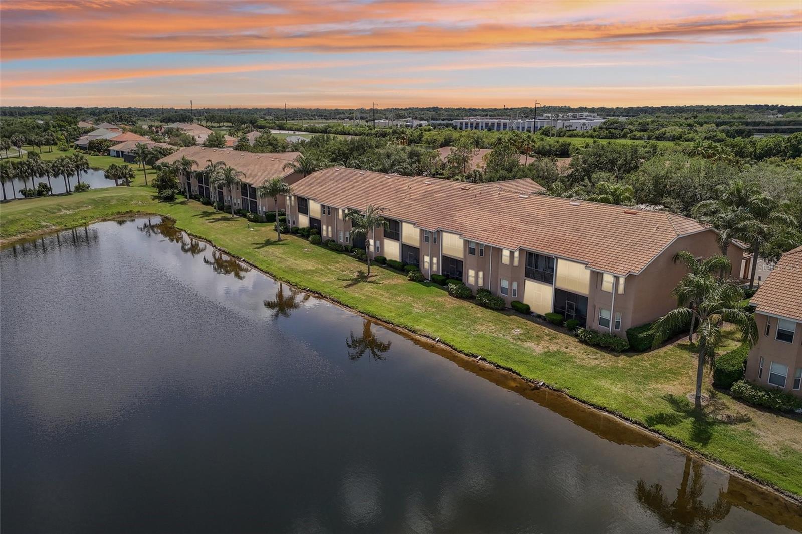 Largest Ashton Model | End Unit | Golf & Water Views | Flood Zone X | Home Warranty Included
Why settle for an interior view when you can enjoy panoramic pond and golf course scenery from your private screened lanai? This second-floor end-unit offers the largest carriage home floor plan in Stoneybrook, featuring vaulted ceilings, abundant natural light, new flooring, new stainless appliances, and a versatile den.

Located in Flood Zone X and surrounded by resort-style amenities, this move-in ready home combines lifestyle, location, and value. Seller is including a one-year home warranty. Schedule your showing today and see why this home stands out from the competition.
