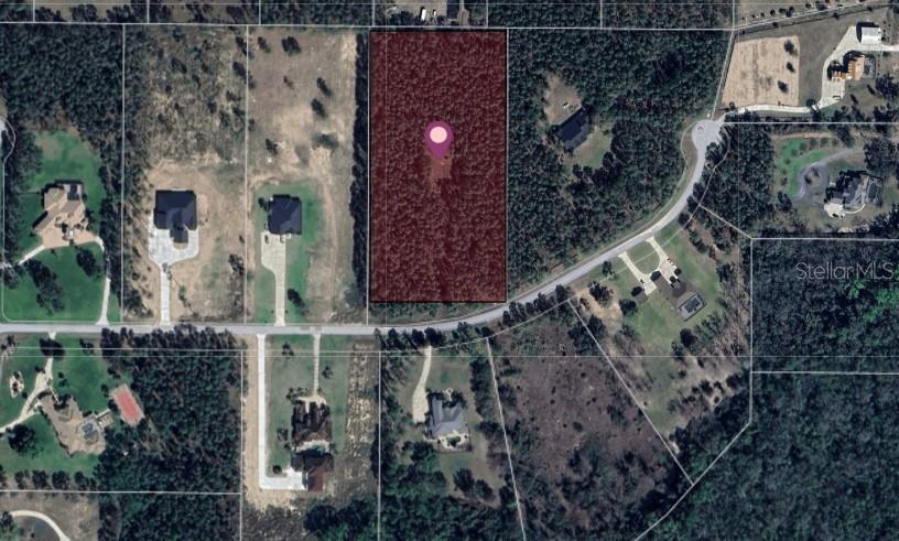 Trade the noise for nature on this 5.74+/- acre slice of quiet Florida countryside, located on the tucked away Silver Charm Ct. Picture gentle breezes, and plenty of room to create your dream residential estate home. Whether you're envisioning a modern farmhouse, weekend getaway this property is positioned perfectly—close enough to Orlando for easy access, yet far enough to truly disconnect. Just down the road, Lake Harris and the Harris Chain of Lakes invite you to explore over 76,000 acres of water and endless recreation. The neighborhood is guided by deed restrictions —buyer to verify.

All information is believed accurate and correct but not guaranteed or warranted and subject to change without notice.