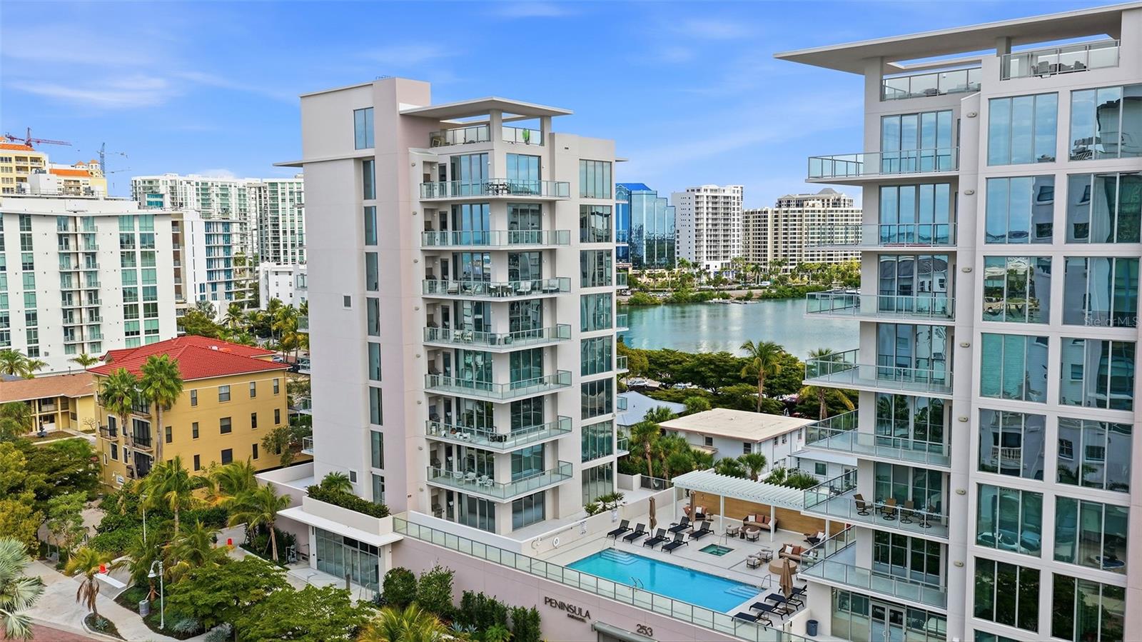 Newly completed, Peninsula Sarasota is ideally positioned in the coveted Golden Gate Point neighborhood, offering a peaceful residential retreat just moments from the vibrancy of downtown Sarasota. Designed by Blu Interiors, each residence showcases contemporary modern elegance with calming, sophisticated palettes, soaring ceilings, and expansive wraparound terraces that seamlessly blend indoor and outdoor living. Every element reflects a thoughtful commitment to refined luxury.

State-of-the-art kitchens feature sleek European cabinetry, gas cooktops, and quartz countertops, complemented by premium Wolf and Sub-Zero appliances. Additional highlights include hardwood flooring throughout, floor-to-ceiling windows that flood the home with natural light, and a private terrace equipped with a gas grill—perfect for effortless entertaining. The spacious owner’s retreat serves as a true sanctuary, complete with generous walk-in closets, dual vanities, a soaking tub, and an oversized walk-in shower for spa-like relaxation.

Residents enjoy on-site concierge services and secure, access-controlled underground parking for two vehicles, including an EV charging station. A private foyer and dedicated elevator provide direct access to exceptional amenities such as a resort-style pool and state-of-the-art fitness center, while the elegant owner’s club room offers private wine storage for each residence. The communal rooftop terrace sets the stage for unforgettable gatherings, boasting sweeping panoramic and sunset views.

Peninsula Sarasota delivers a truly elevated lifestyle within a lush, tropical setting—just minutes from Sarasota’s celebrated arts, culture, dining, and award-winning beaches. A rare opportunity to experience sophisticated coastal living. Schedule your tour today!