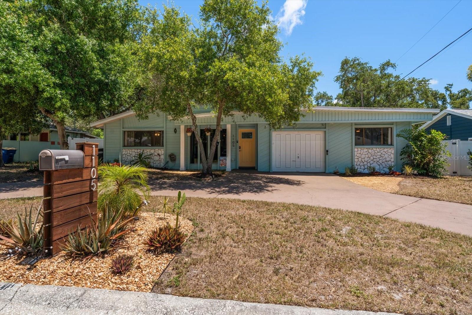 Extraordinary pool home on the edge of Dunedin off Edgewater Dr. with exquisite updates throughout! Open floor plan with vaulted ceiling, new roof in 2022, luxury vinyl flooring installed 2021, beautiful Stone fireplace in living room, spectacular saltwater heated pool and patio with new cage (2024), newer appliances, cabinets and counters in kitchen, updated baths, new storage shed… Wonderful outdoor living space with huge fenced yard, firepit, built-in grilling station, beautifully landscaped for low maintenance. Near the cul-de-sac on this lovely no through street, the home is situated within a short golf cart drive to Main St., Dunedin and a a stroll or bike ride down the sidewalks along Edgewater Drive. Enjoy amazing sunsets at the end of your street, relax at Edgewater Park, enjoy a wonderful dinner at many of the fabulous restaurants in Dunedin, dock your boat at Dunedin Marina and just a quick 2 mile drive to Clearwater Beach. This home is a must see. A great primary residence or investment property!