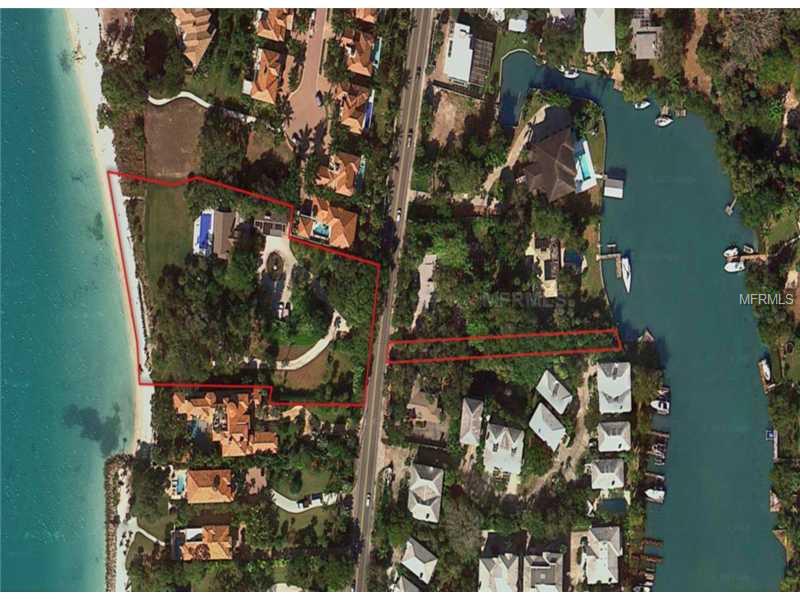 This very special 2.97+ acre prime North Siesta close-in ESTATE PARCEL is on the market for the first time in nearly 40 years! A charming 5,000+sf Old Florida style family beach cottage graces the nearly 3 lush unspoiled (but easily divide able) Gulf front acres ...the largest, individual Gulf front Estate parcel on sought after North Siesta Key. Convenient to the north Siesta Key Bridge the property enjoys quick access to the abundant dining, cultural & shopping opportunities of Sarasota & St Armands Circle. The amazing grounds abound with glorious ancient trees and has 264 feet of Gulf beach & Big Pass frontage! Located in the pristine Estate area of North Siesta Key, it also includes land & a private dock on PROTECTED Cocoanut/Nettie Bayou Sailboat water. Lavish in magnificent sunsets. Pass the day in your heated over-sized 8 foot deep pool, mesmerized by views of the ever changing seascapes of boating activity passing through Big Pass. The acreage can be two parcels but currently has one tax ID# for homestead purposes. Tax records do not reflect accurate survey information. There is also a fully equipped, totally self sufficient 1,158sf 2/2 en suite Guest House over 3 car Garaging BUT the value resides in the land.  Numerous possibilities exist: Personalize and maintain as a warm, gracious 'Old Florida' family compound; Build your dream house and create a NEW MAJOR LANDMARK ESTATE... or DIVIDE and keep part. At nearly 3 acres, the largest & best located Estate parcel of its kind!