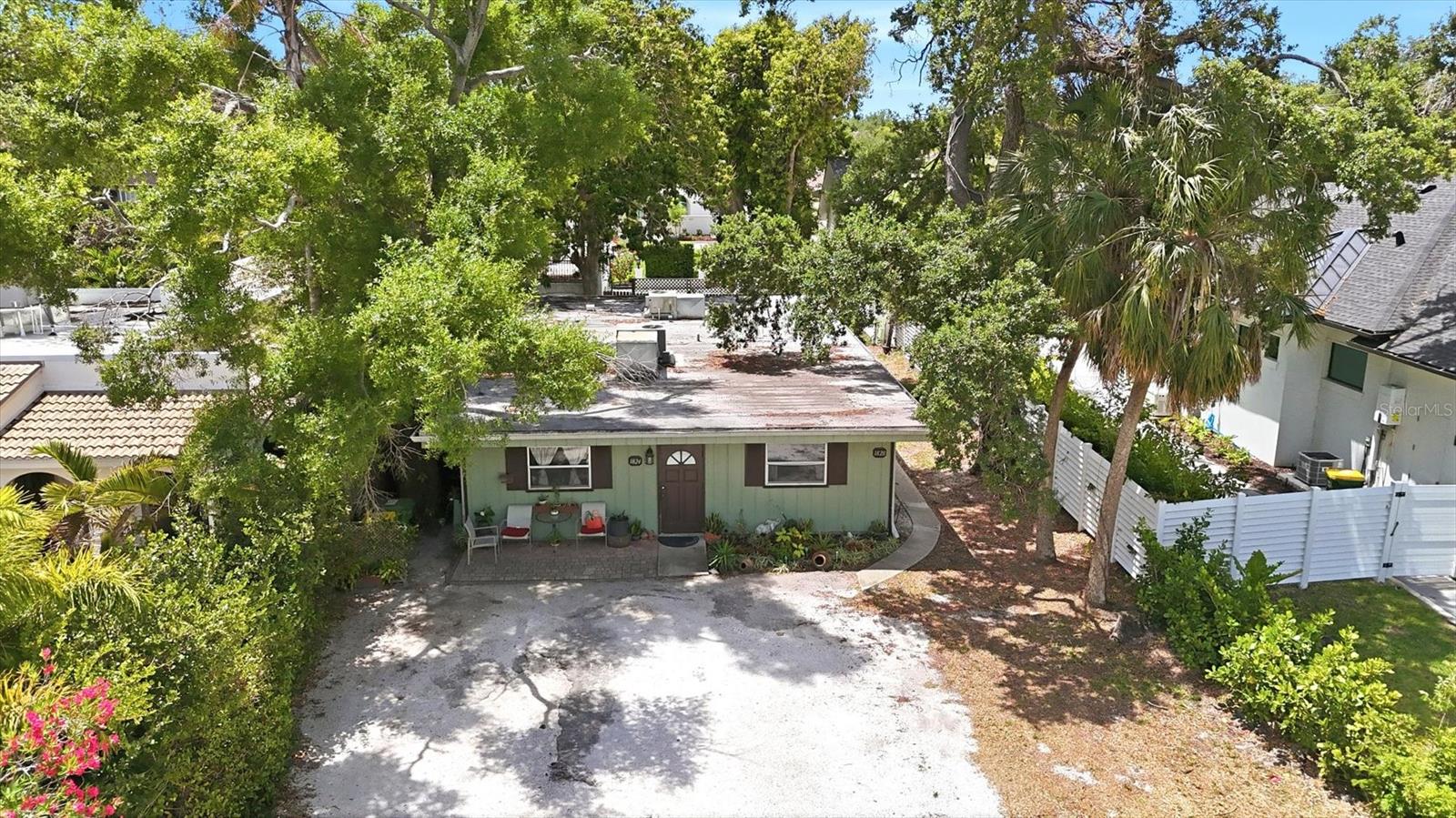 Investor / Builder Alert! Exceptional WEST OF TRAIL opportunity in one of Sarasota’s desirable neighborhoods, Poinsettia Park. Located just steps from top-rated Southside Elementary School, this property offers incredible potential for redevelopment.
The existing structure is a grandfathered duplex that is in very poor condition and best suited for teardown. The true value lies in the land — a 50’ x 118’ lot ideally positioned for a stunning new custom home.
Enjoy a highly sought-after location just minutes to the shops and dining of Southside Village, the world-renowned beaches of Siesta Key, and the vibrant arts, dining, and waterfront lifestyle of Downtown Sarasota.
Whether you’re a builder, investor, or end user looking to create a dream home, this is a rare chance to build new in an established, high-demand area surrounded by luxury properties. Opportunities like this are becoming increasingly scarce—don’t miss your chance to capitalize on this premium location!