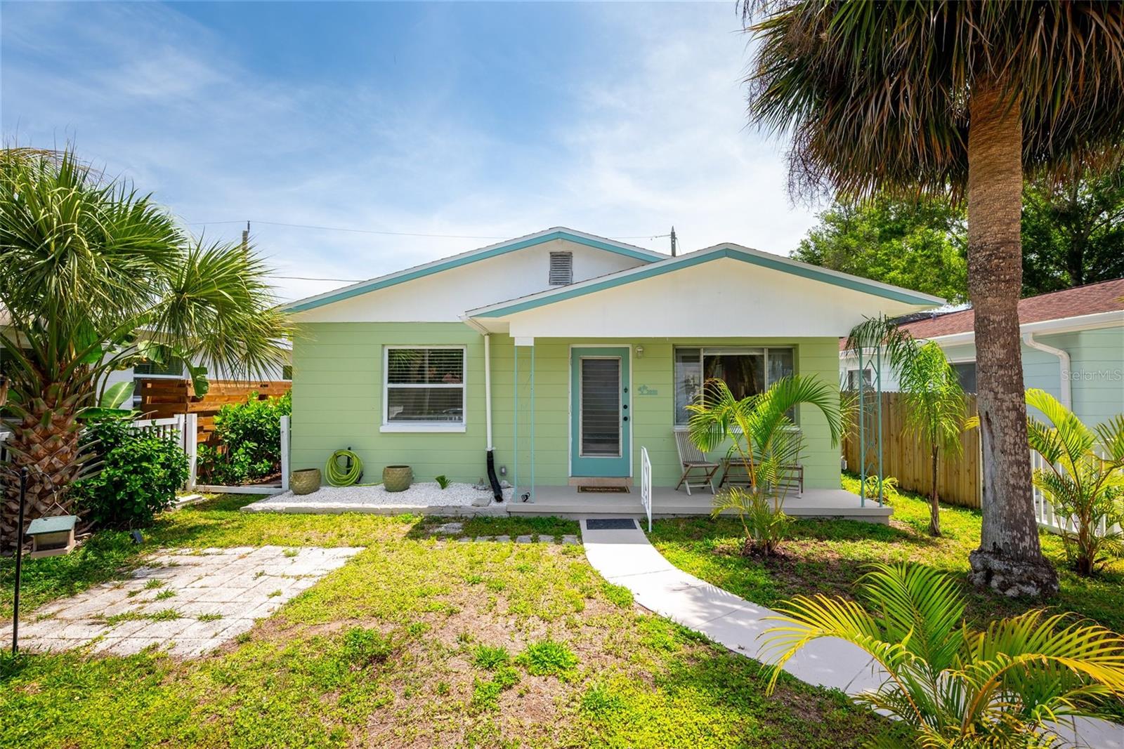 This newly remodeled, 2-bedroom, 2-full bathroom solid block bungalow offers the perfect blend of historic charm and modern luxury in the heart of Gulfport’s vibrant Art District. Positioned on a picturesque, hand-laid brick street, this home places you steps away from the eclectic Tuesday Fresh Market, lively festivals, and famous Boca Ciega Bay sunsets. This home has been completely updated with fresh interior and exterior paint, giving it a crisp, turn-key feel. The open living space flows into a fully updated kitchen featuring brand-new stainless steel appliances. With two full, completely renovated bathrooms, this home ensures modern comfort and style in every corner.   The spacious outdoor patio is a true standout, offering a versatile space for entertainment or your latest creative projects. After a day at the nearby beach, enjoy a refreshing rinse in the private outdoor shower. The fully fenced yard provides a safe sanctuary for pets, and don't forget to grab a fresh mango! Start your mornings on the sweet front porch, a classic feature perfect for sipping coffee and greeting neighbors on one of Gulfport's iconic historic brick-lined streets. Whether you are looking for a creative retreat or a coastal sanctuary, this bungalow captures the very best of Florida’s most artful community.
Note: Roof 2018. AC 2018. Electric & plumbing 2025.  All permits & inspections completed & receipts available.